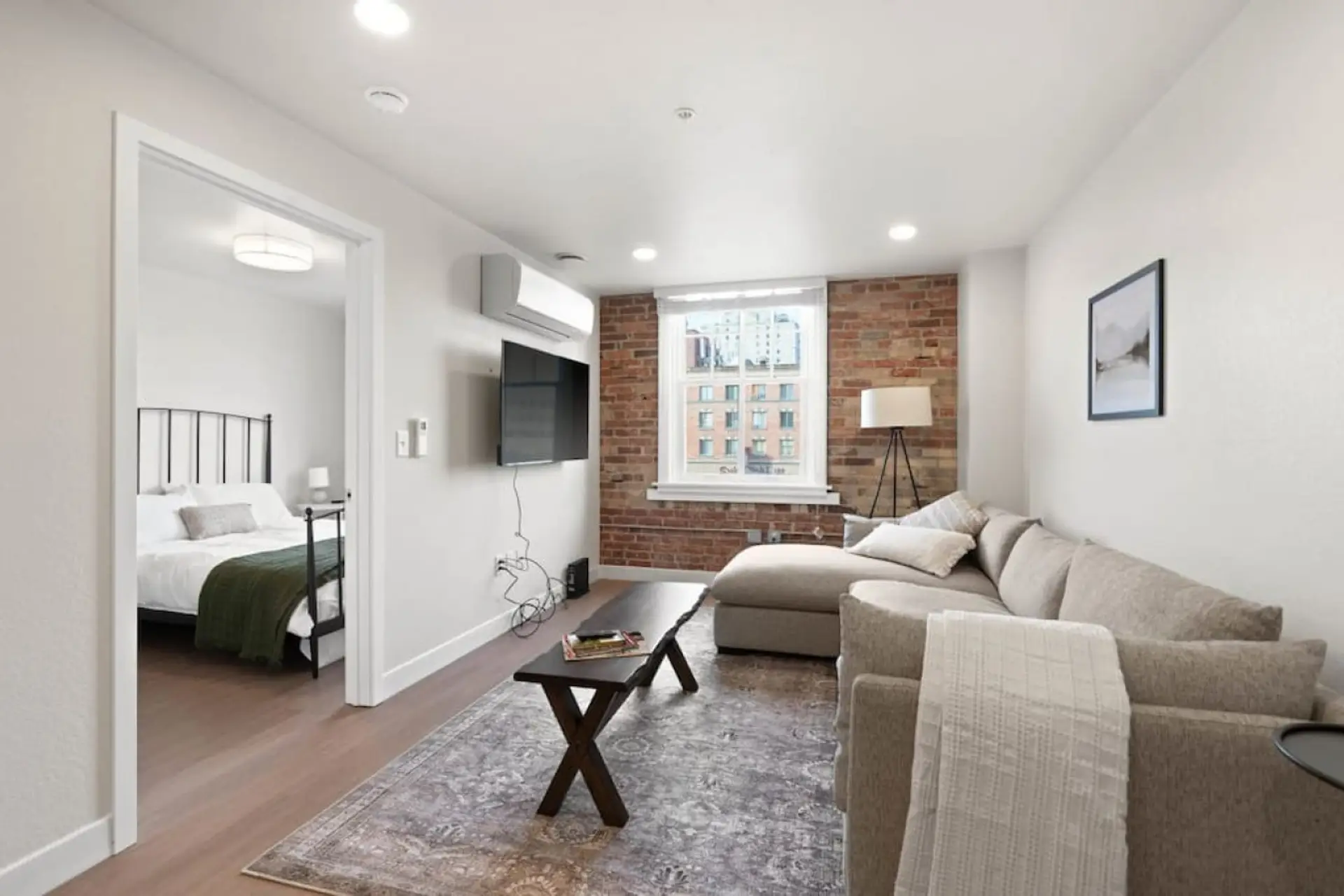 Relax in style—cozy seating with curated art and design accents.
