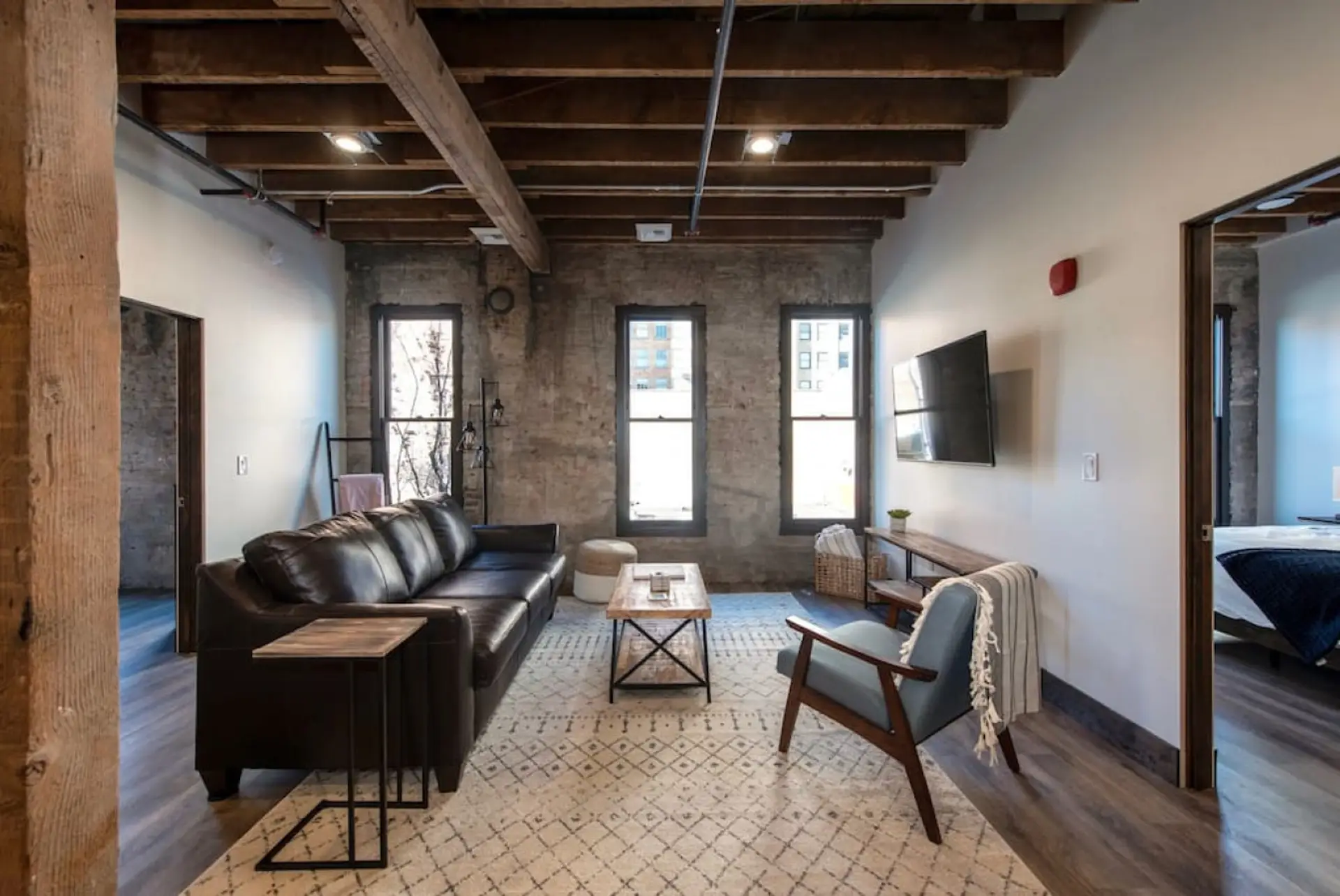 Relax in style—cozy seating with curated art and design accents.