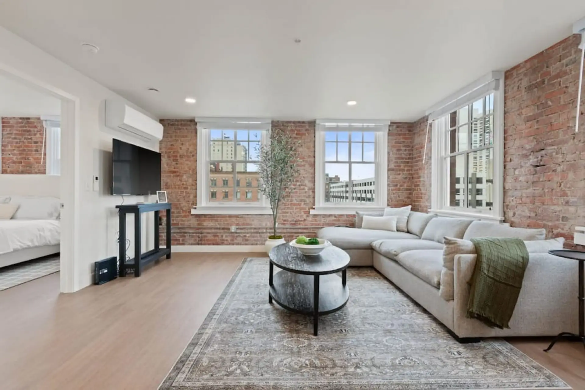 Relax in style—cozy seating with curated art and design accents.