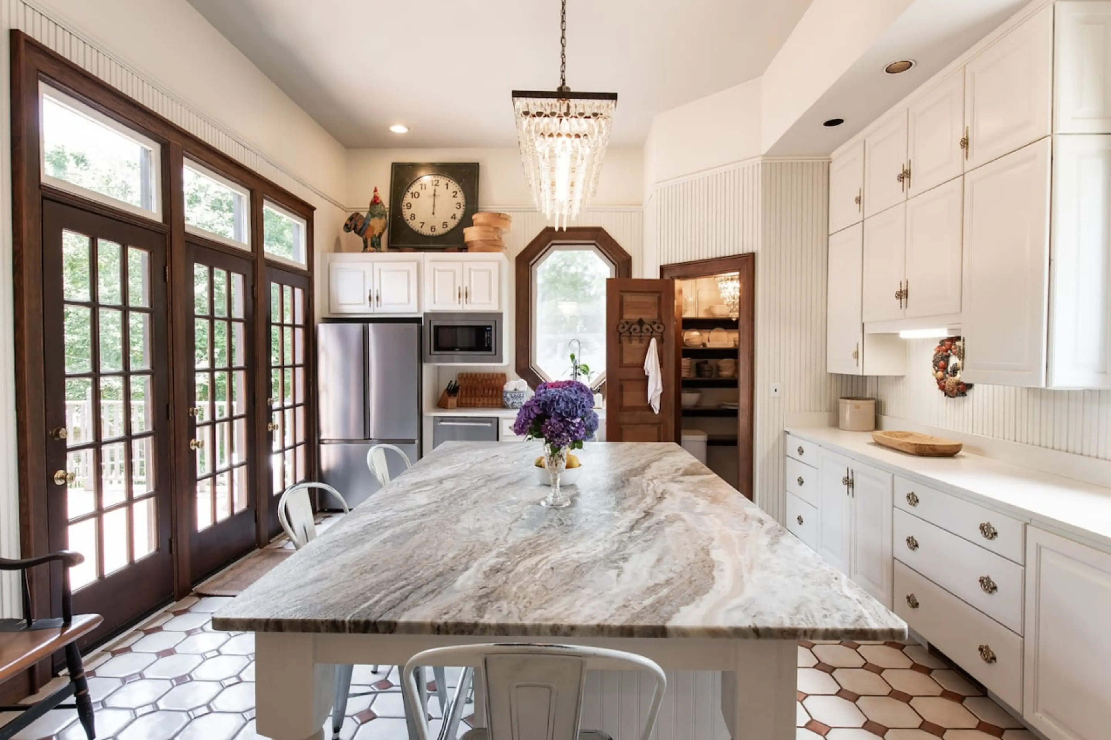 From casual breakfasts to shared meals, this kitchen island is the heart of the home where guests can gather, connect, and create lasting memories.