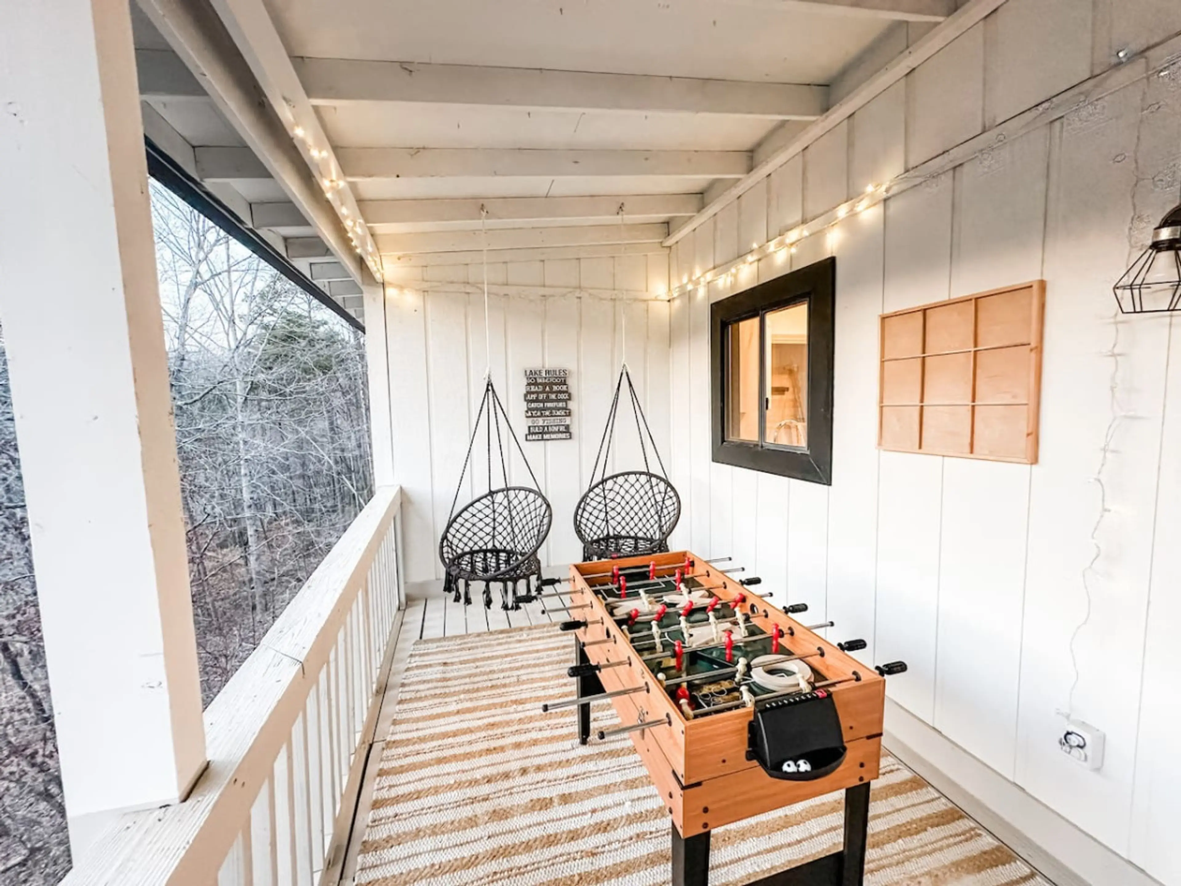 Relax on the peaceful back porch and embrace the beauty of the outdoors.