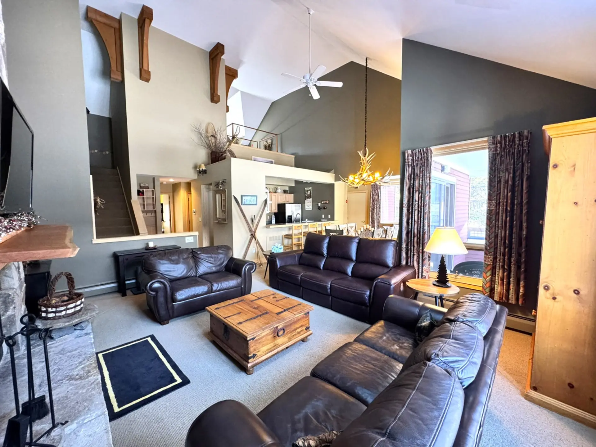 living room- Dining and Kitchen with vaulted ceiling