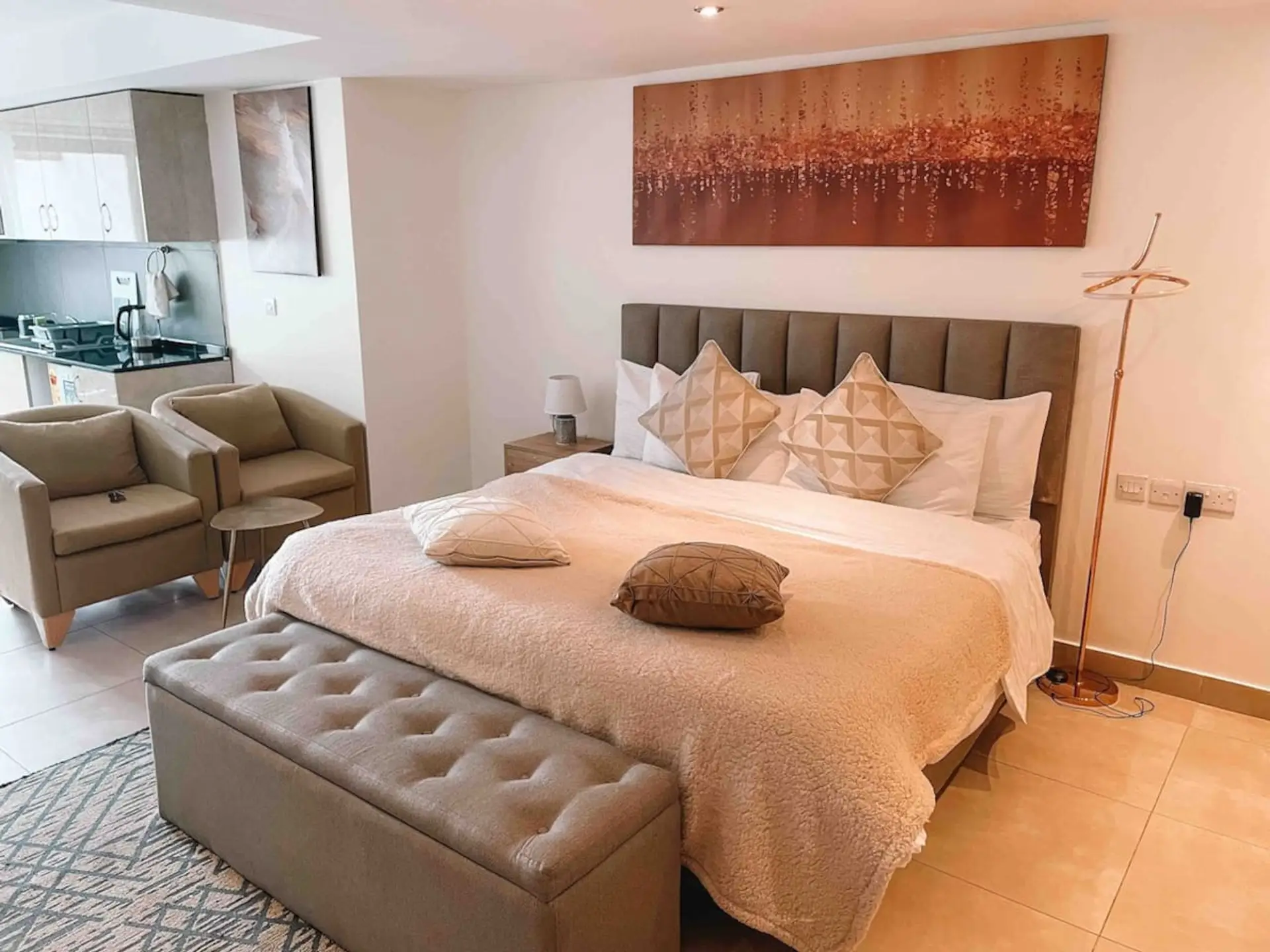 Sky Suites studio bedroom and lounge in Airport Residential, Accra