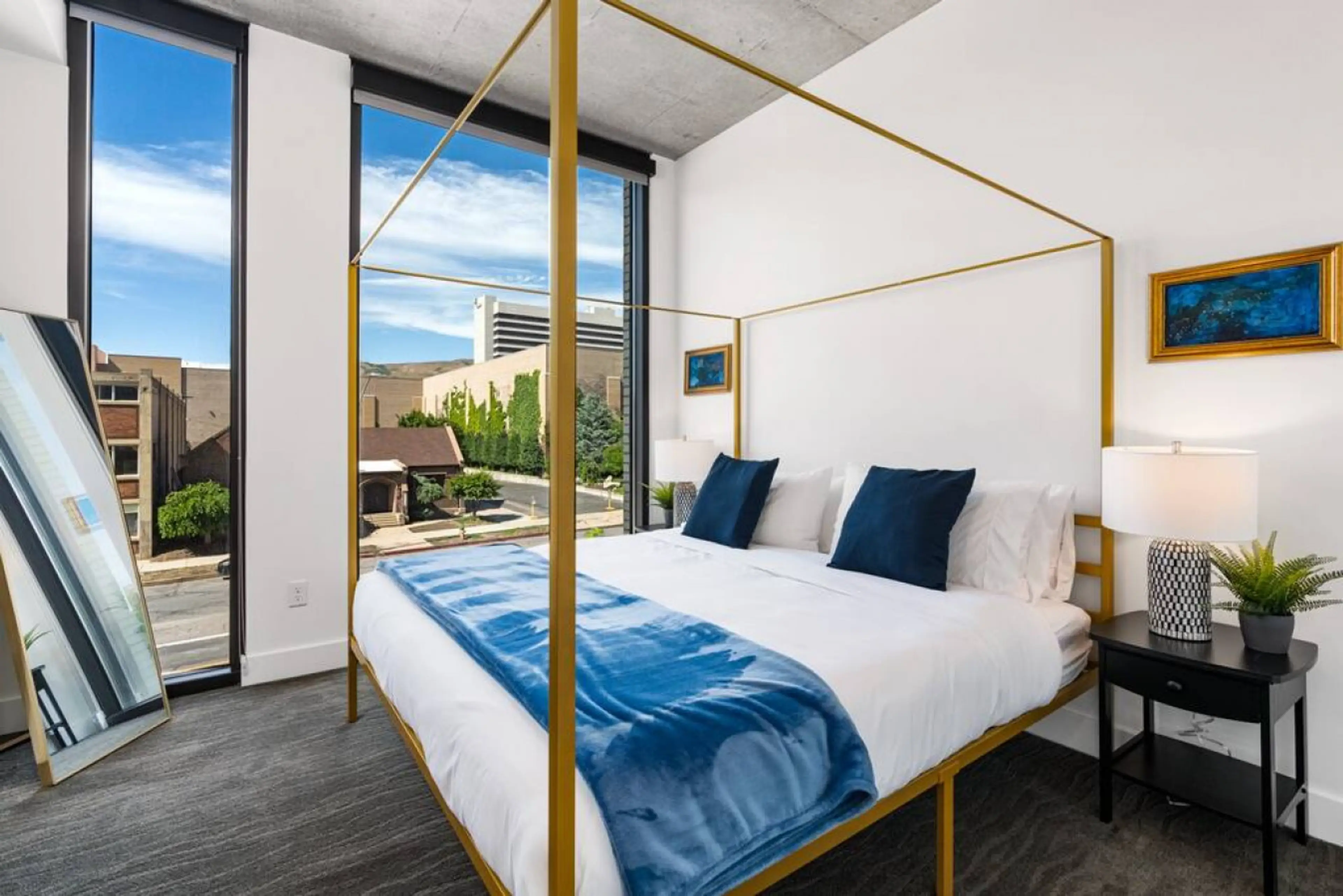 Relax in this highly designed bedroom with stunning views