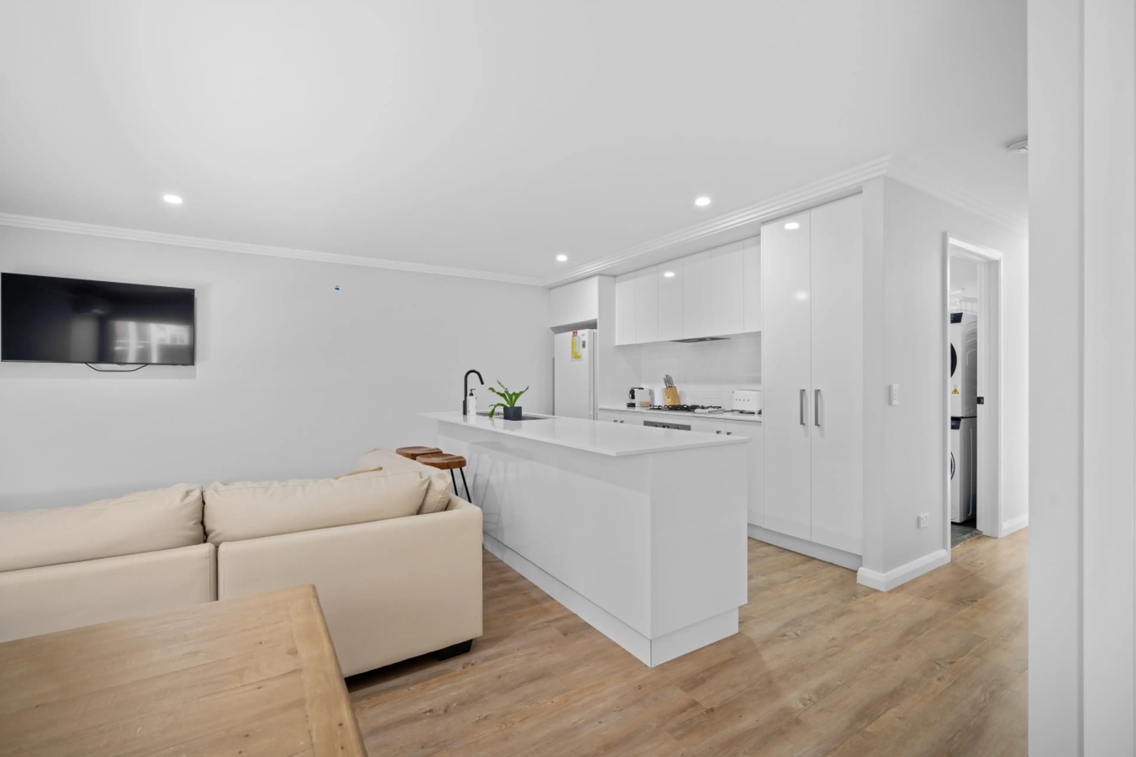 An easy, open layout that makes cooking, relaxing and gathering feel effortless.