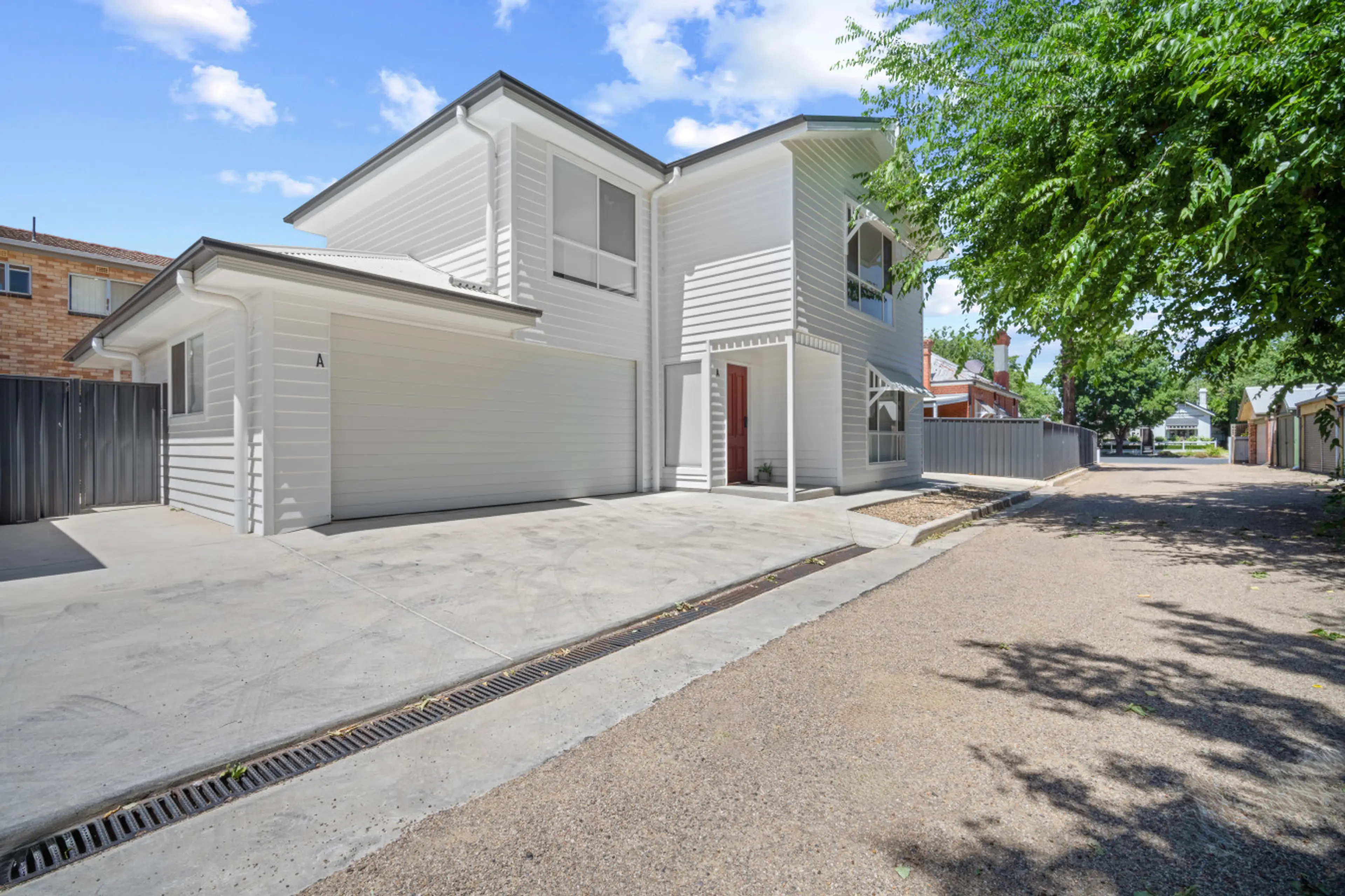 A modern, centrally located townhouse offering a quiet