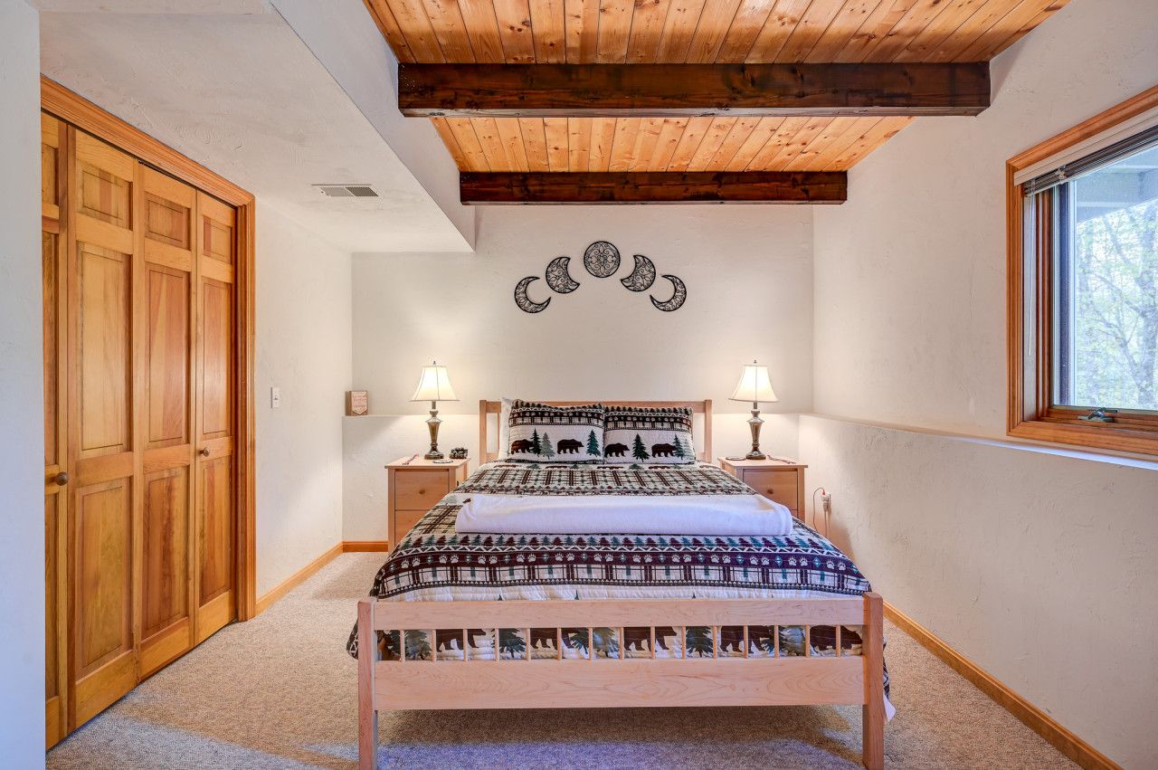 Master bedroom with king bed, AC, attached bathroom and 2 closets