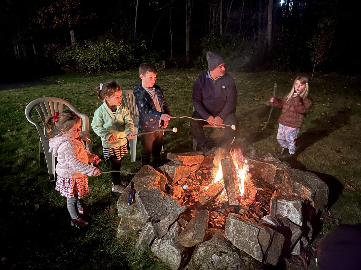 Nestled within a stunning chalet, our property offers an expansive front yard where you can revel in outdoor playtime and gather around the inviting fire pit for memorable evenings under the stars.