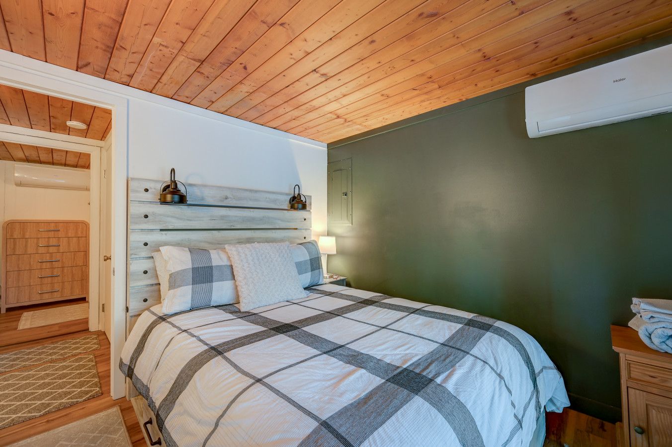 Queen bed with luxurious linens, AC, and a slider out to the yard