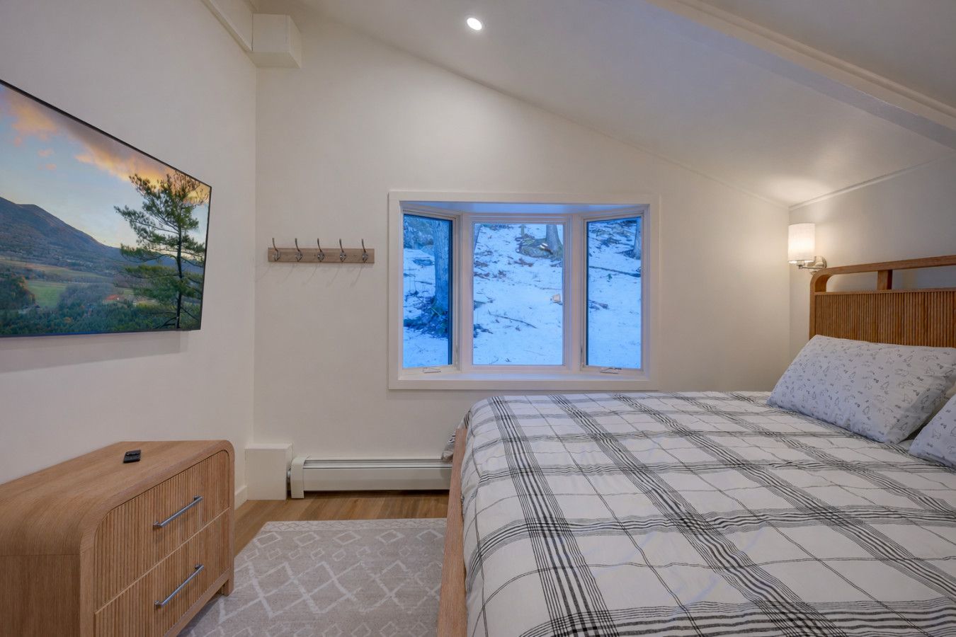 King bed with luxurious linens and AC