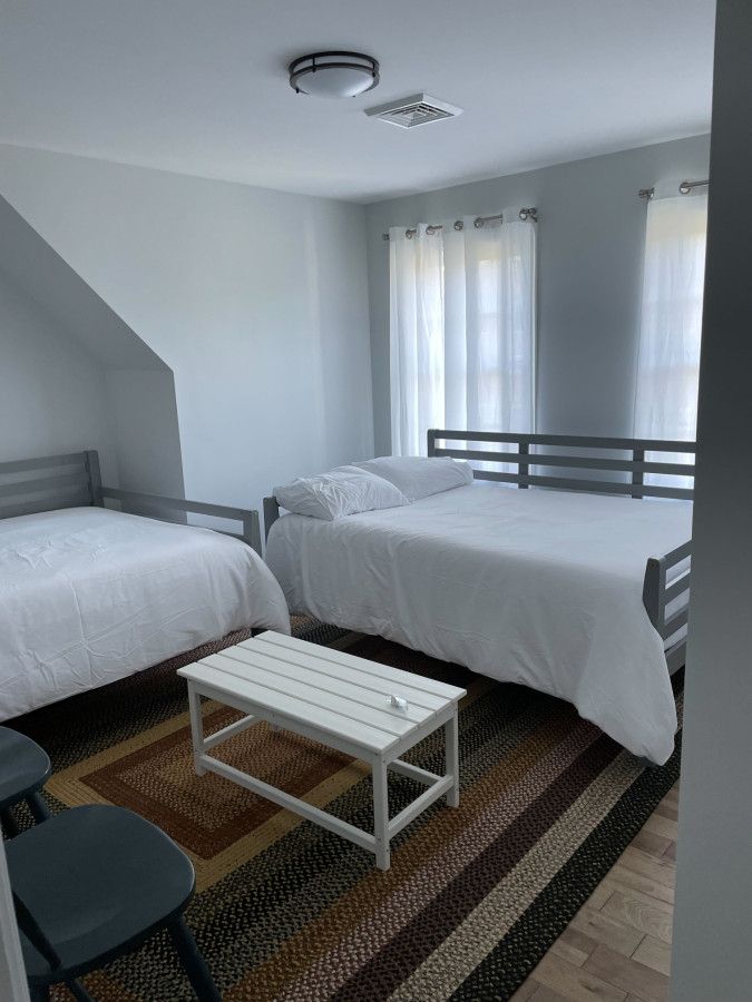 Bedroom 4 with two full beds