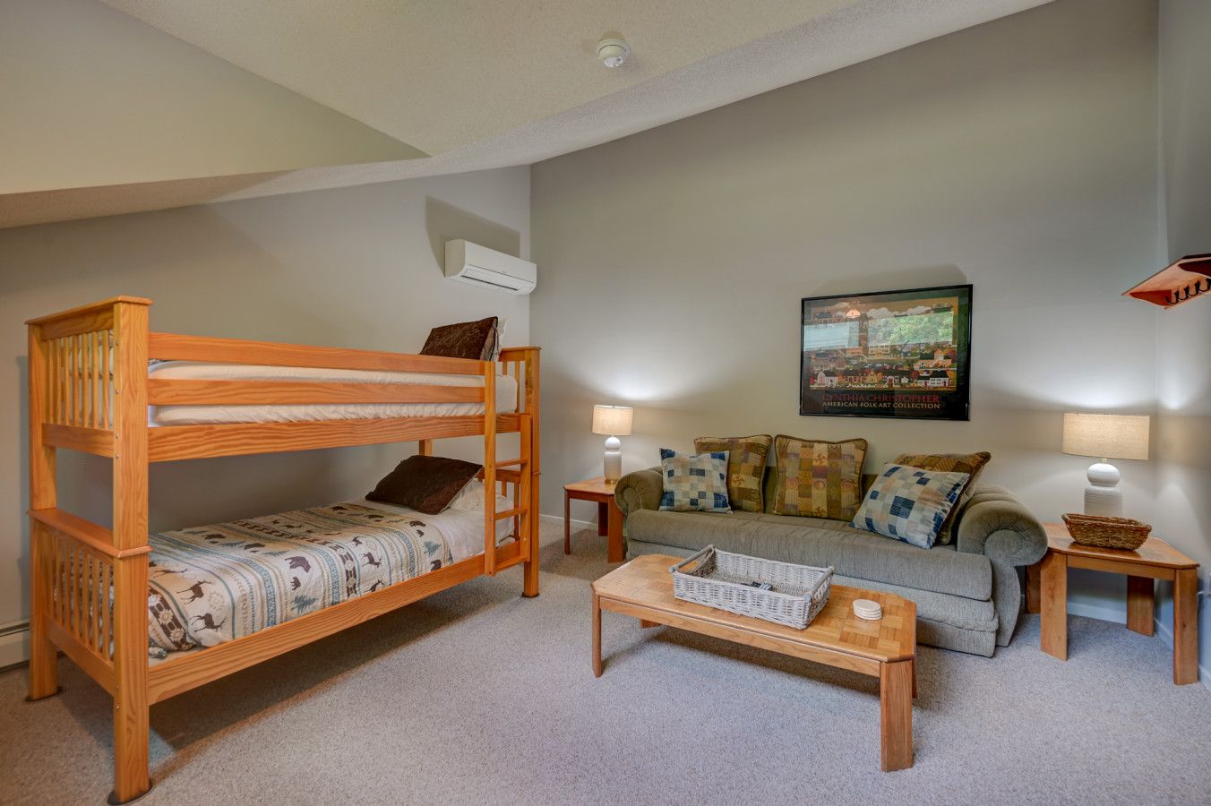 1 twin over twin bunk bed · Open sleeping area without a door
