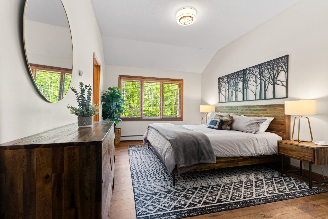 King bed w/ attached private full-bathroom on the upper floor