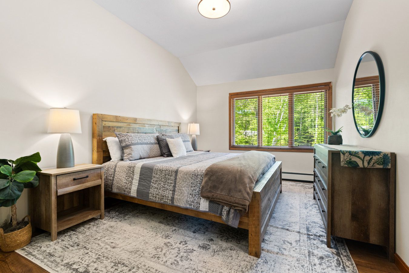 King bed w/ attached private full-bathroom on the upper floor