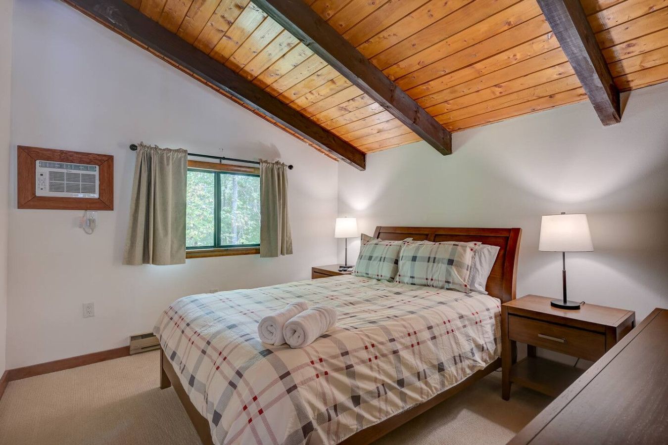 Queen bed on the upper level