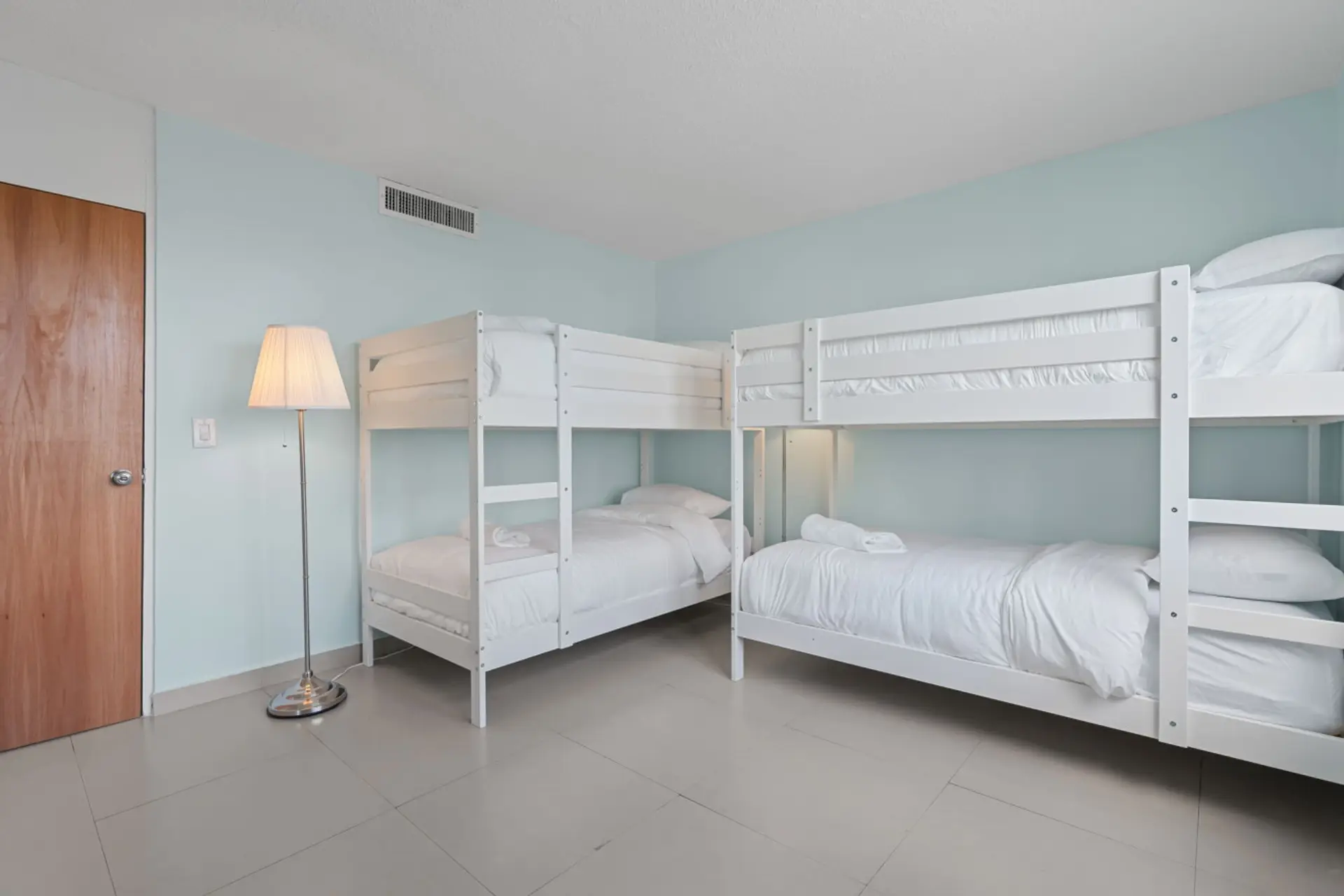 Family bunk room with two twin-over-twin bunk beds