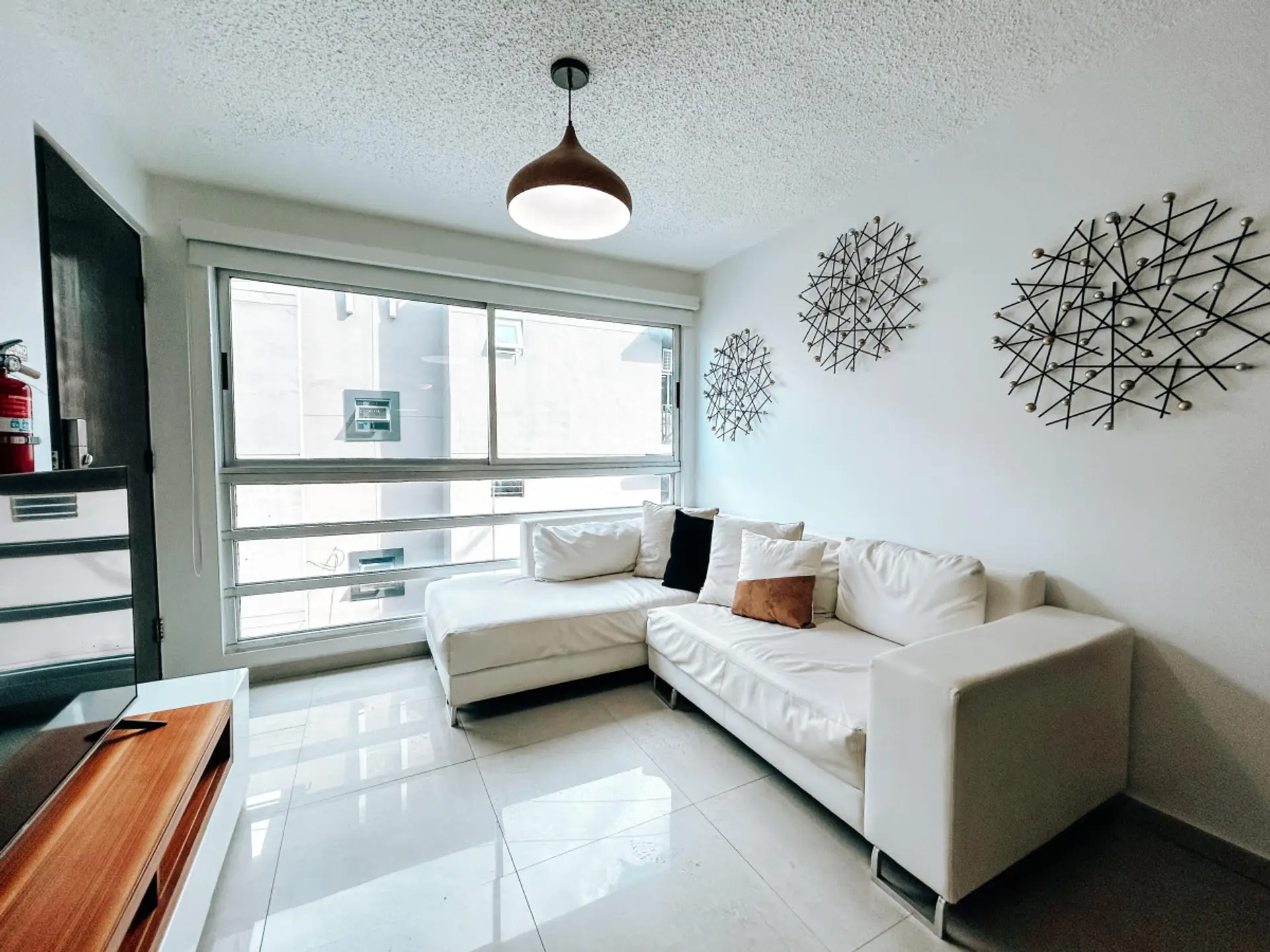 Step into a space where style meets relaxation. Our spacious living room invites you to unwind in ultimate luxury.