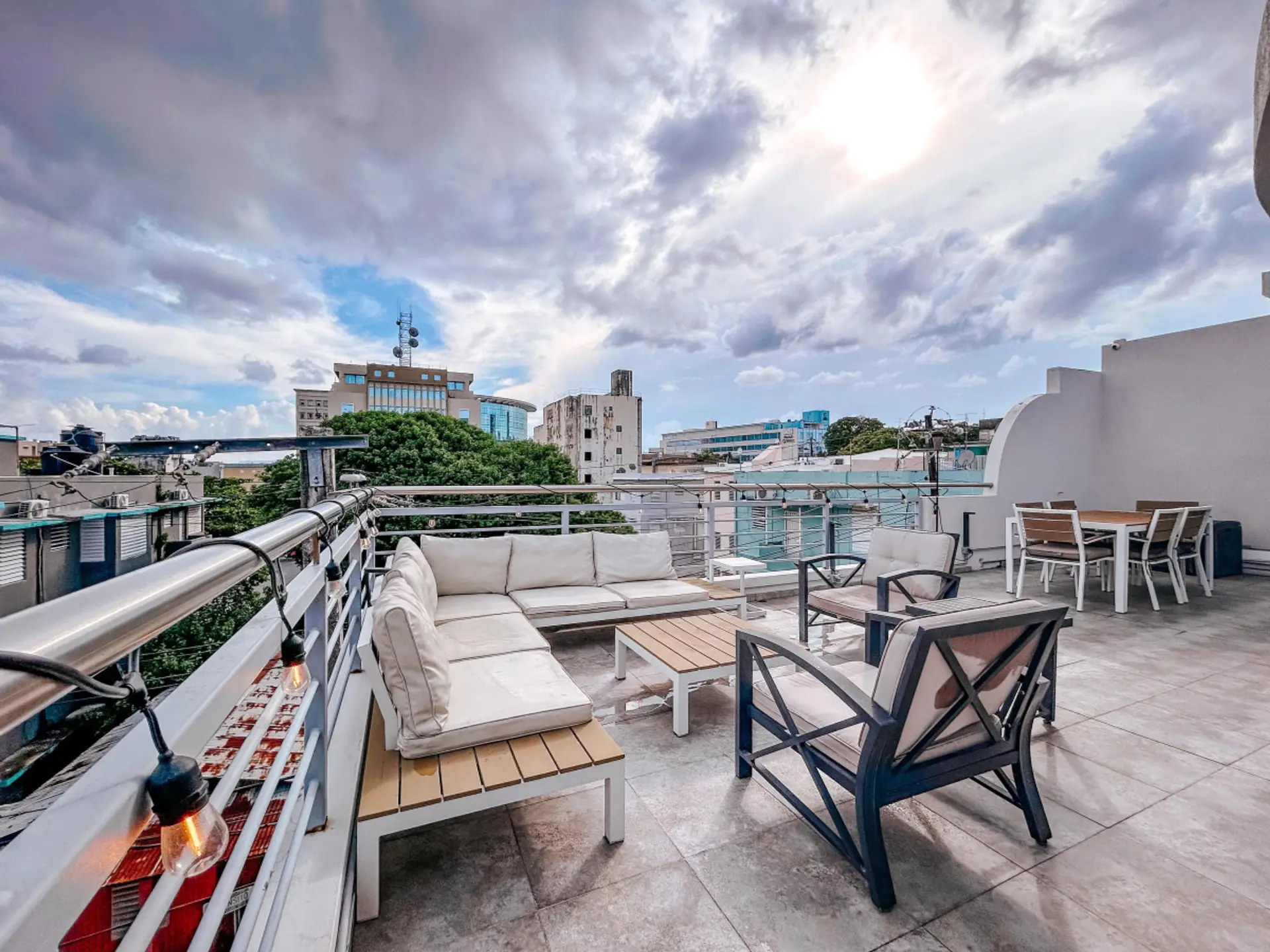 Relax on a spacious rooftop terrace offering breathtaking views and an intimate setting for outdoor enjoyment.