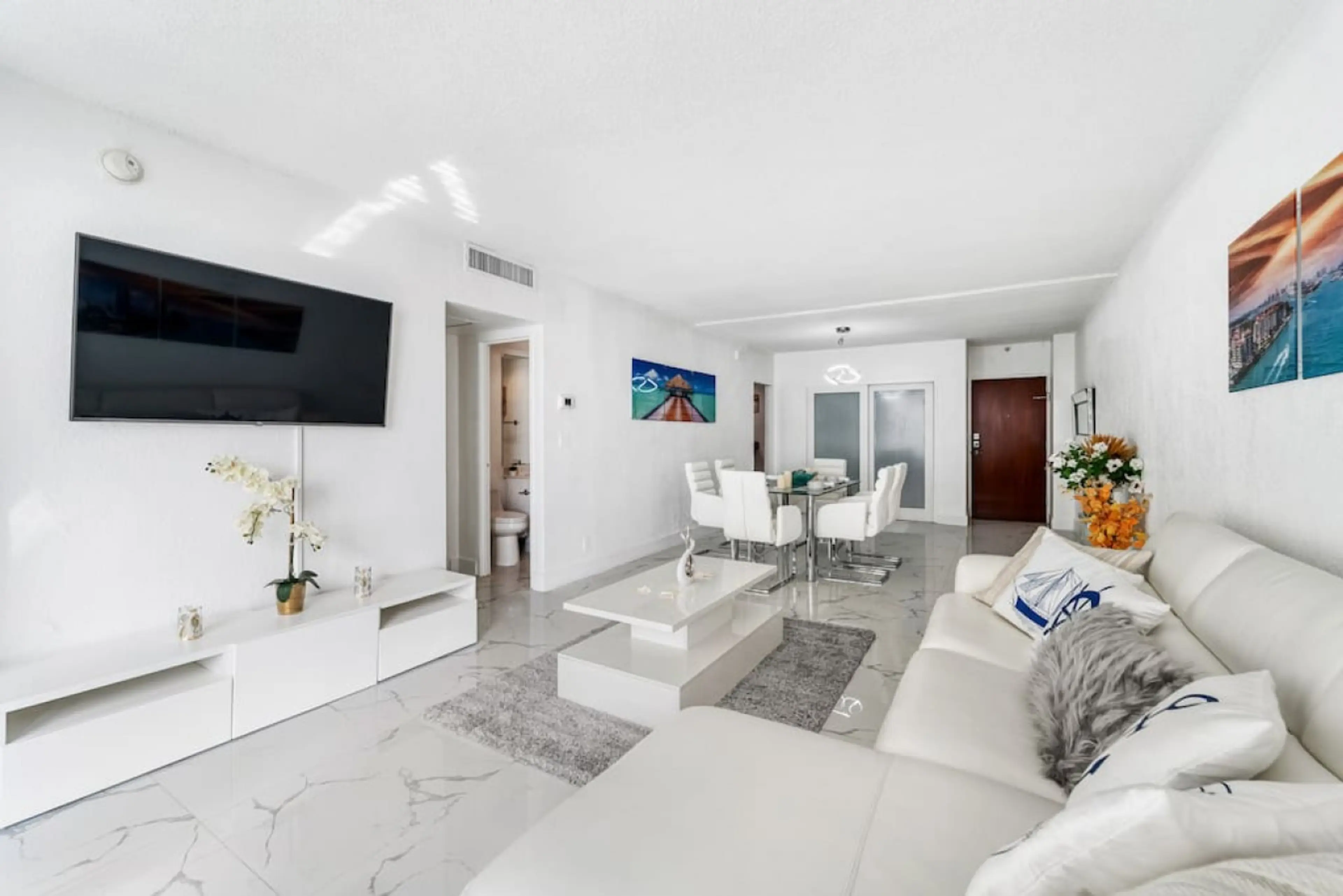 Bright and airy living space with premium amenities and ocean view access