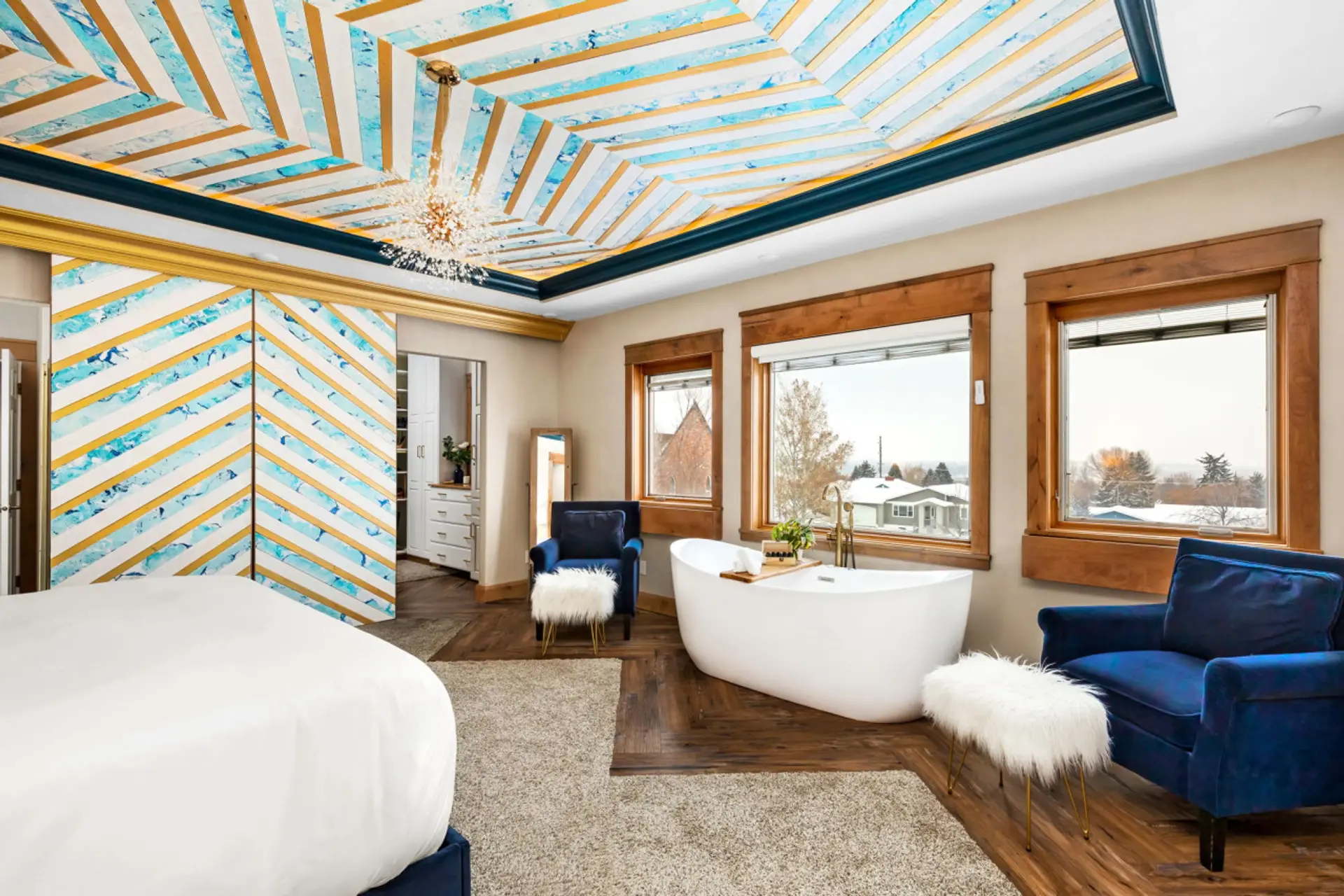 Master Suite Luxury: Jetted Freestanding Tub with City Views & Remote-Controlled Shades