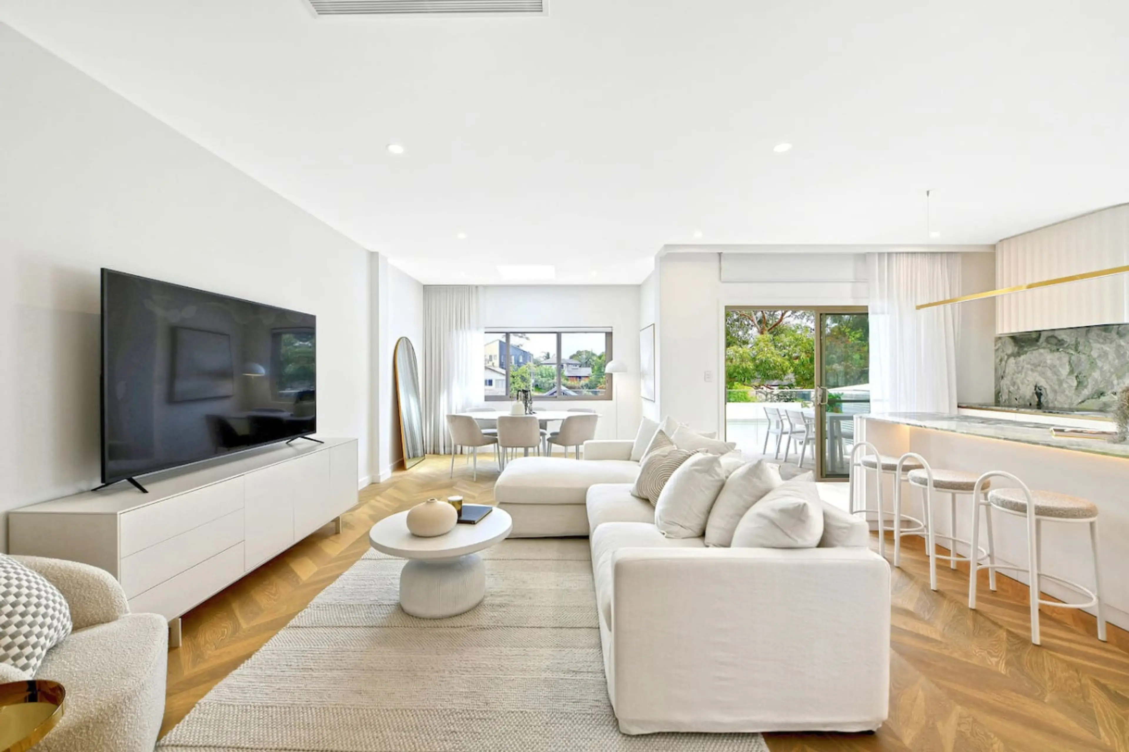Bright and spacious living area with modern furnishings.