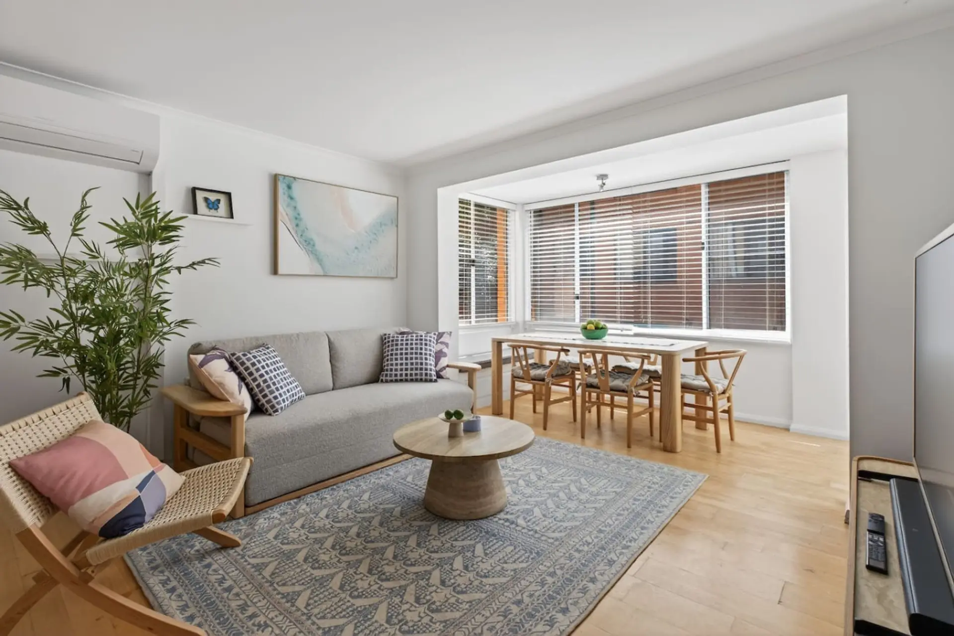 Spacious living room with AC and smart TV. The fold-out sofa sleeps up to two extra guests - please advise at the time of booking if you’ll be using it so we can prepare additional linen.