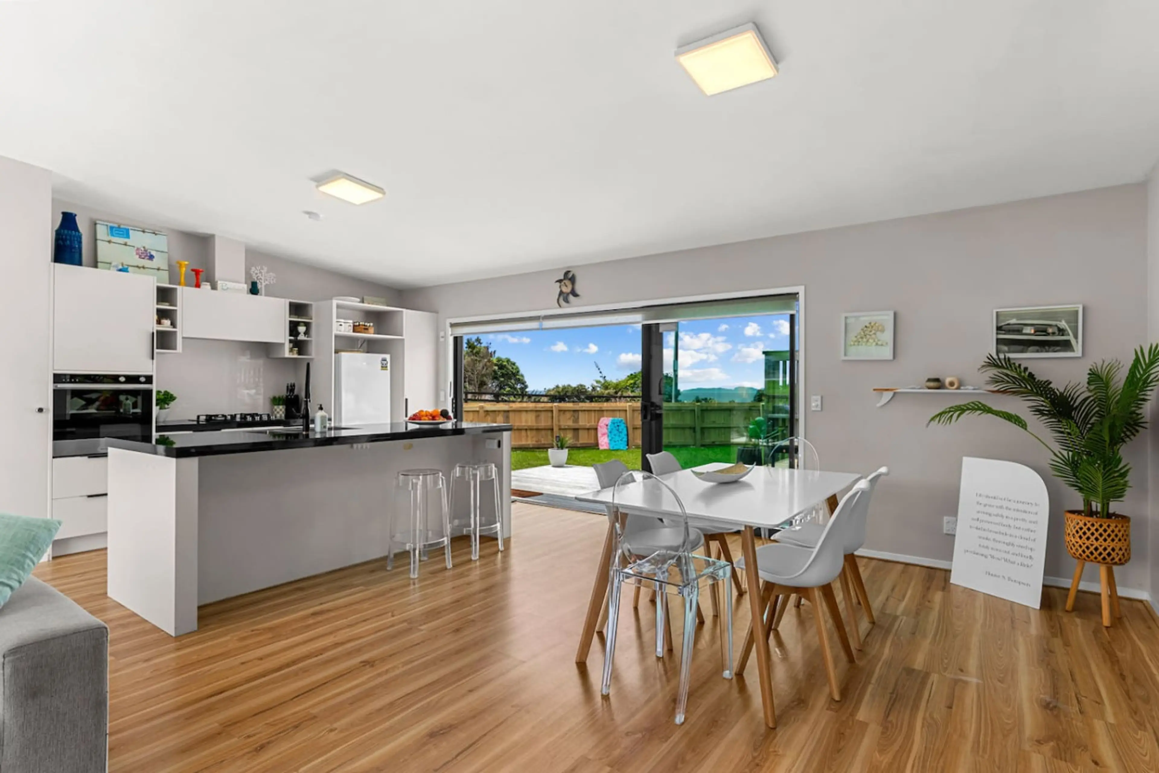 Modern kitchen with breakfast bar and outdoor flow