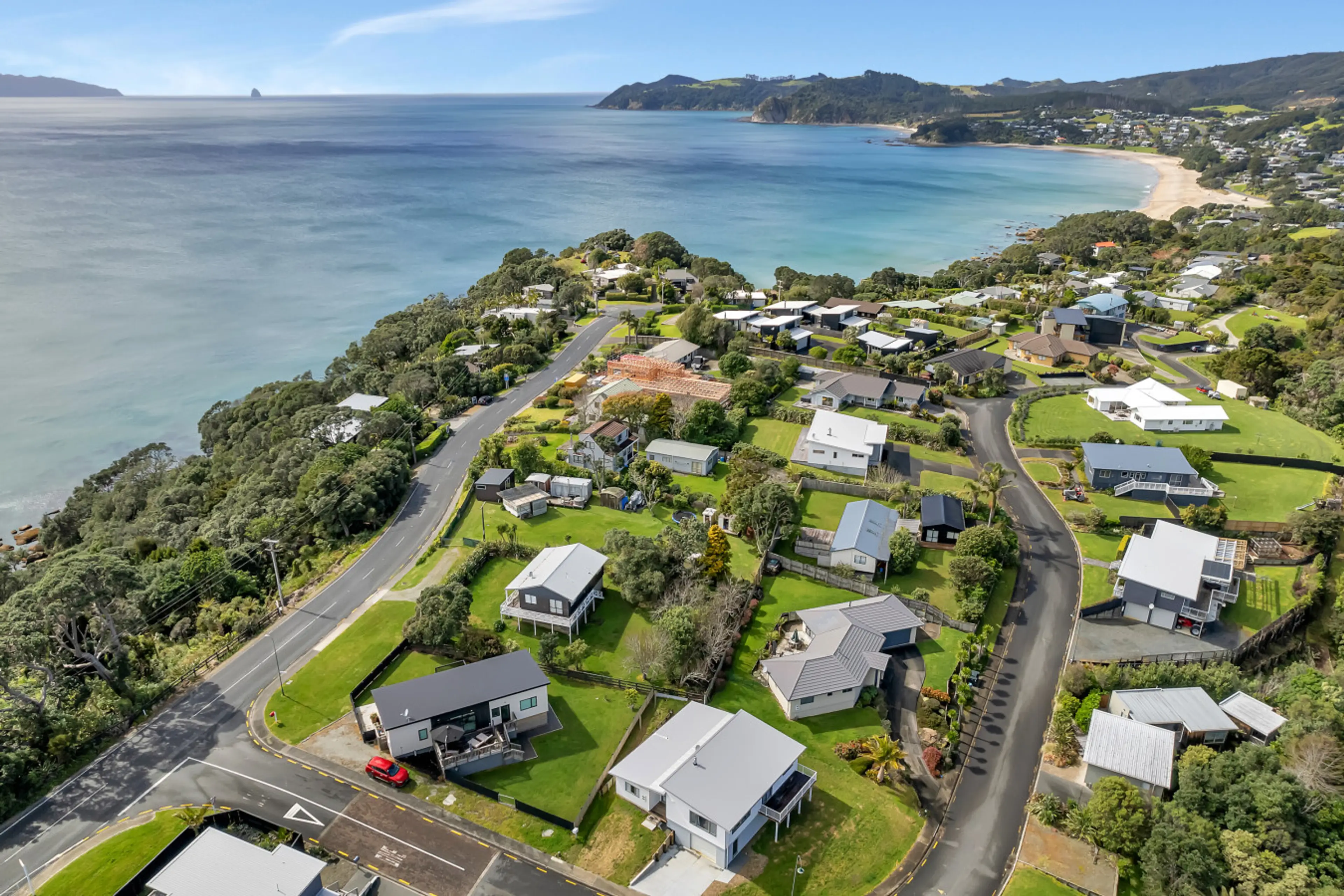 Just a short stroll from Langs Beach, the home enjoys a prime spot with sweeping ocean views and a relaxed coastal setting