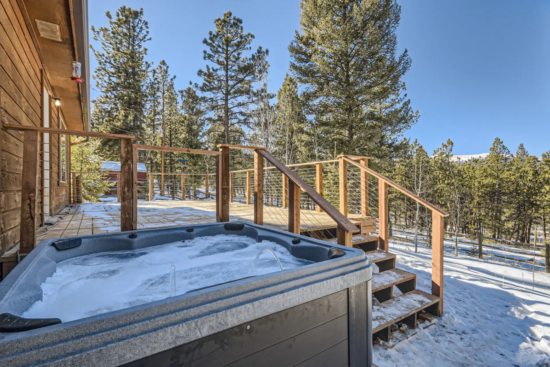 The exterior of our Airbnb transforms into a winter fairy tale scene, ideal for those who love the serene beauty of the colder months.
