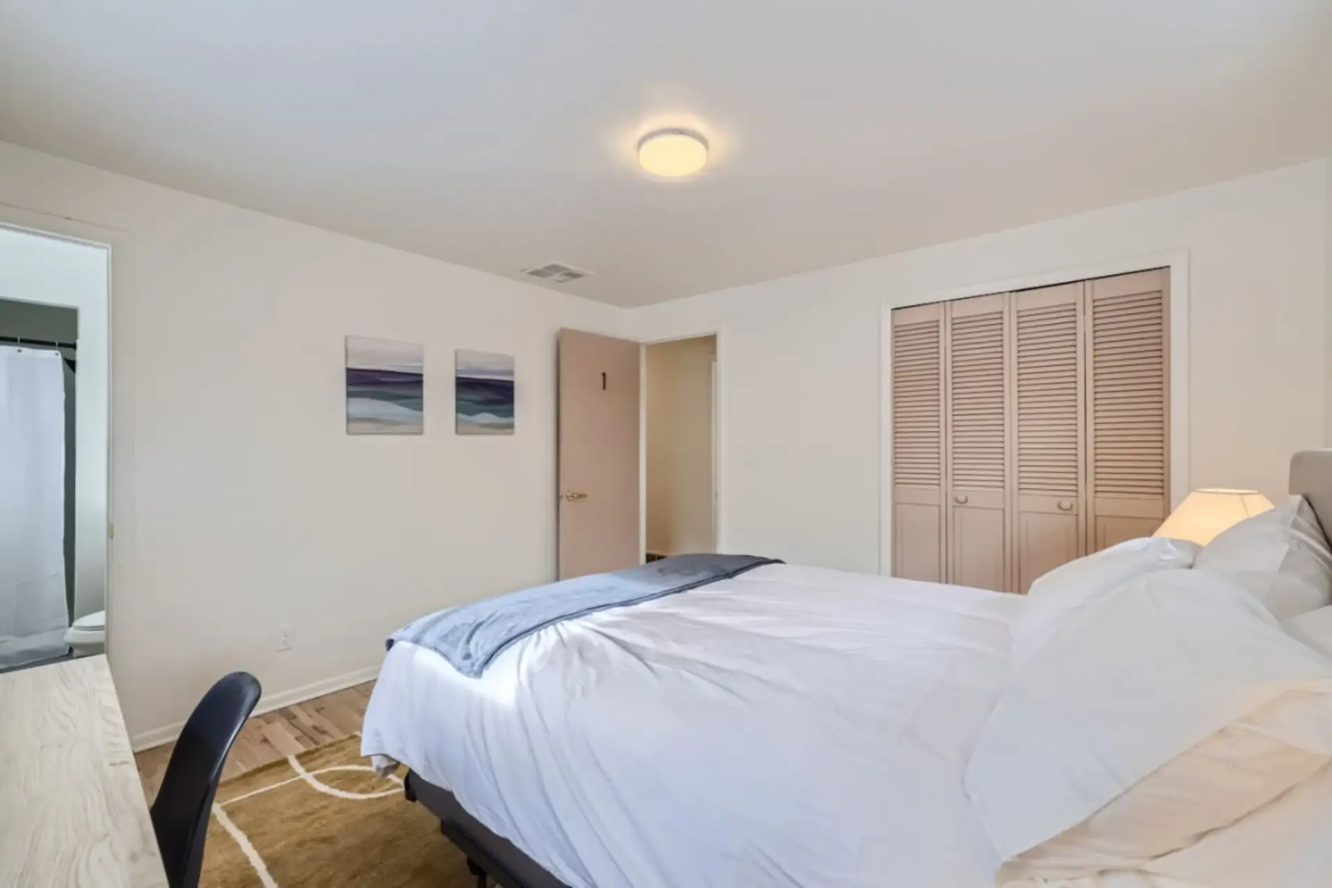 Our cozy bedroom not only promises a restful sleep but also includes a well-equipped workspace, perfect for staying productive during your stay.