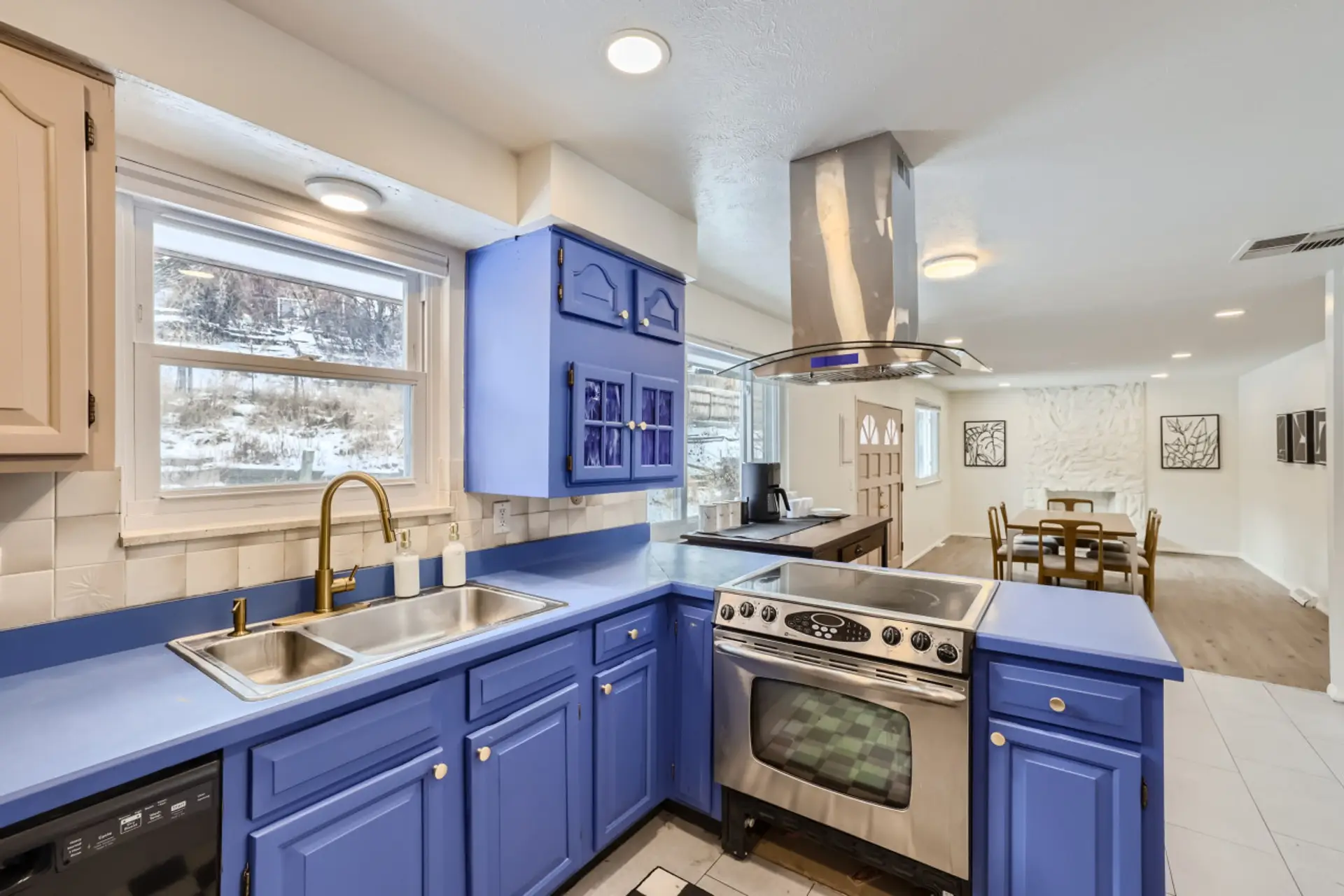 Step into the fully equipped kitchen, designed for your culinary adventures with modern appliances and ample counter space.