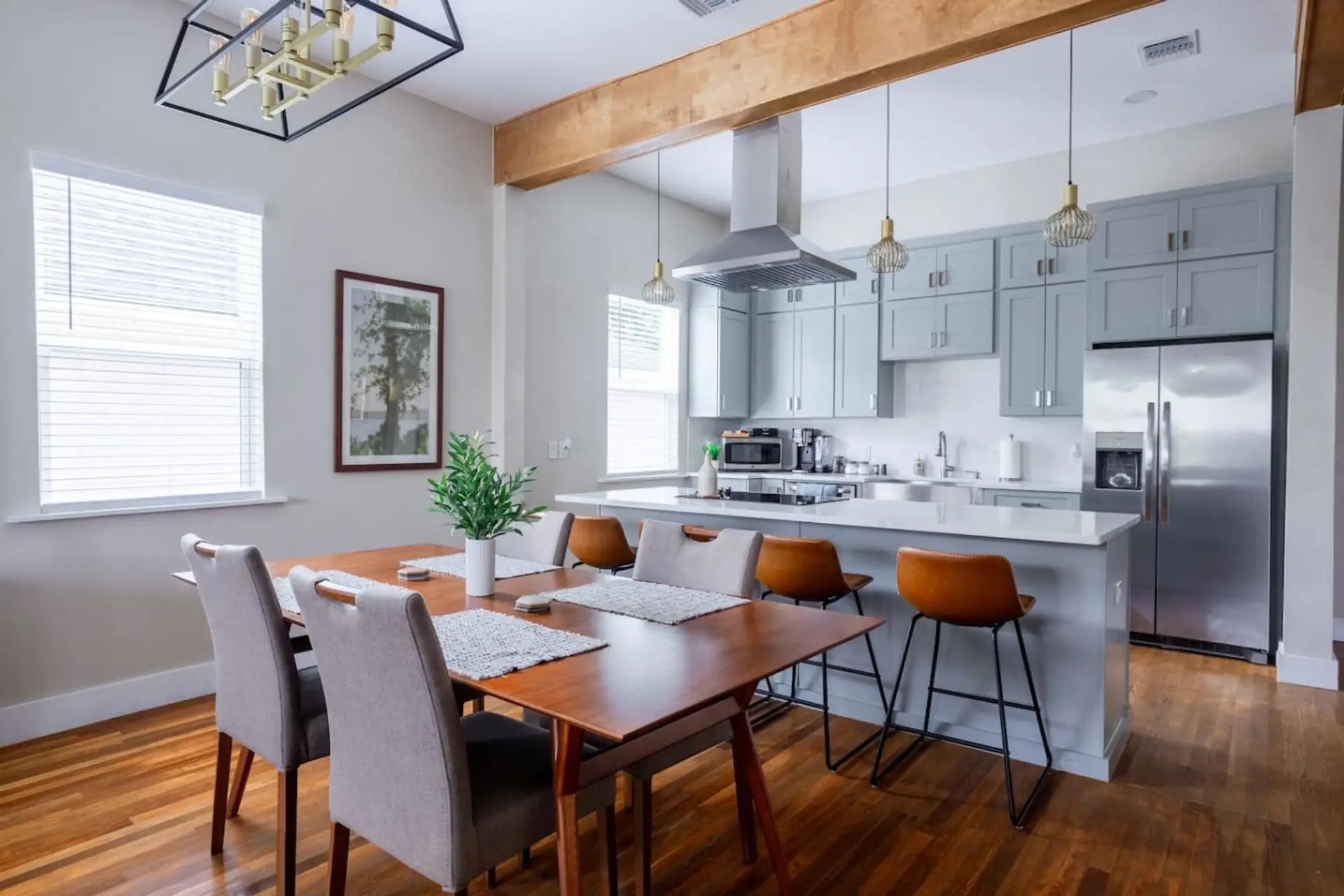 Bright, modern chef’s kitchen with West Elm dining and a stunning open layout — perfect for gathering.