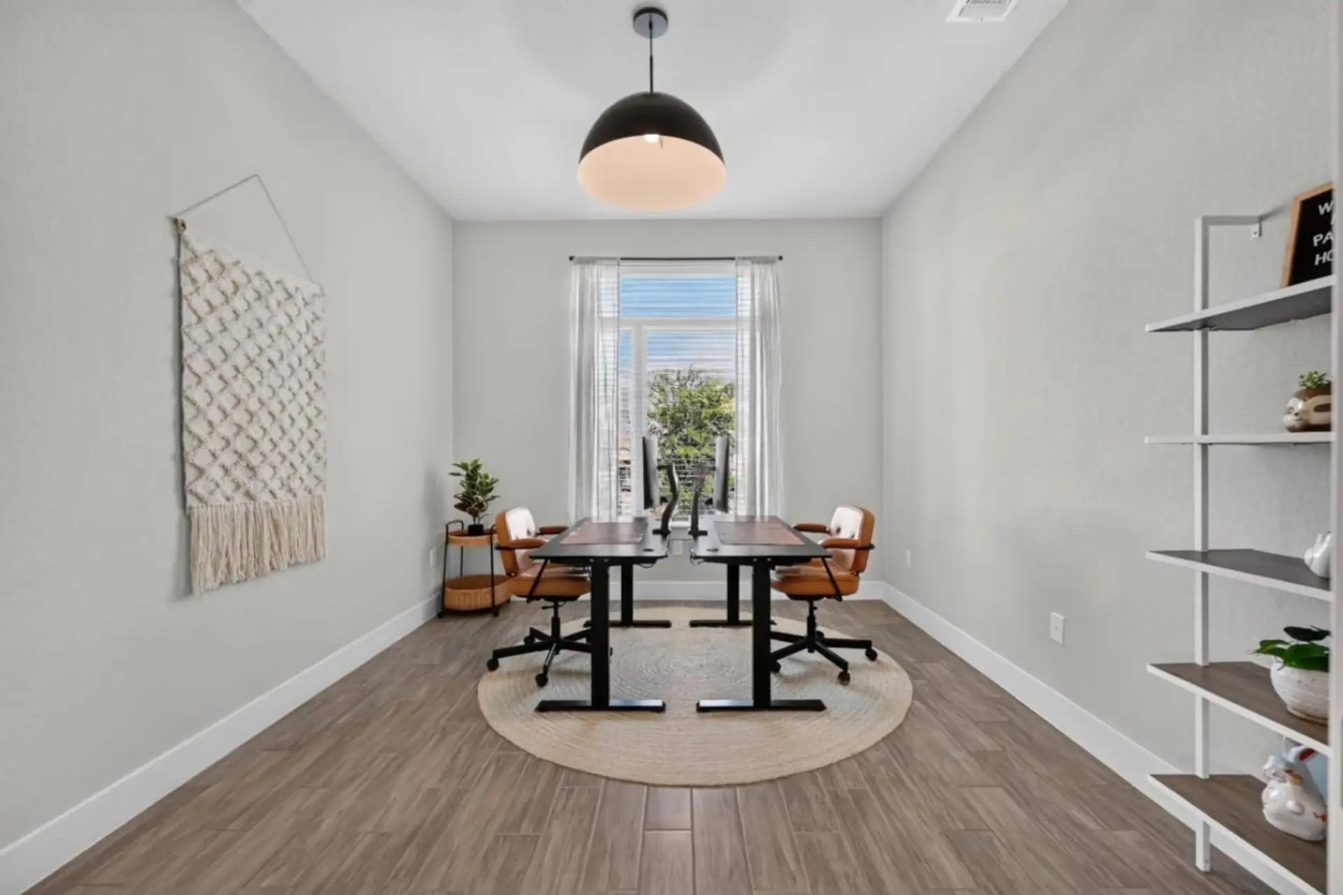 A quiet office with dual monitors, a standing desk, and fast WiFi if you need to get work done