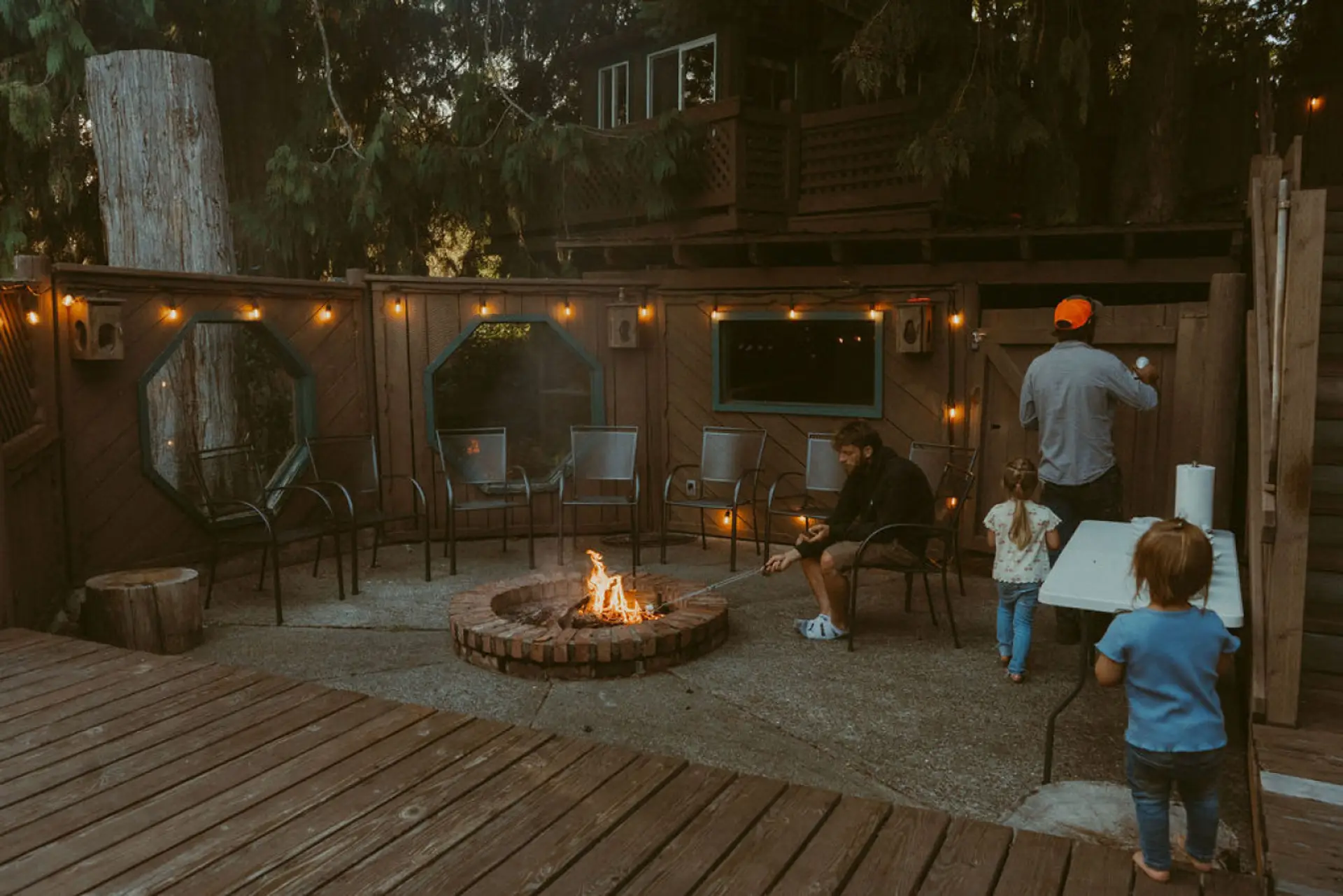 Cozy up by the enclosed fire pit and make some s'mores together.