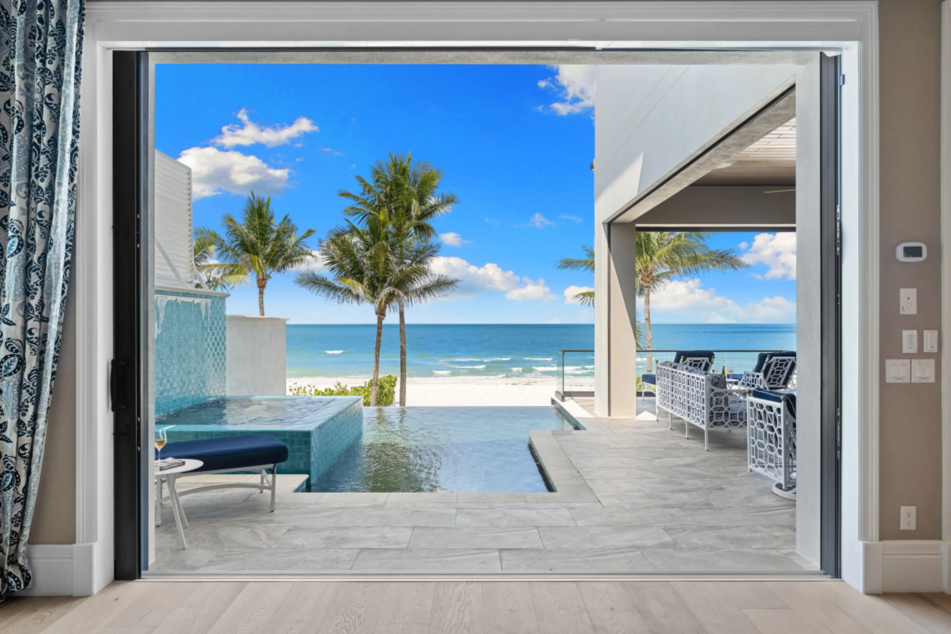 Slide open the doors and let the sea breeze greet your morning swim.