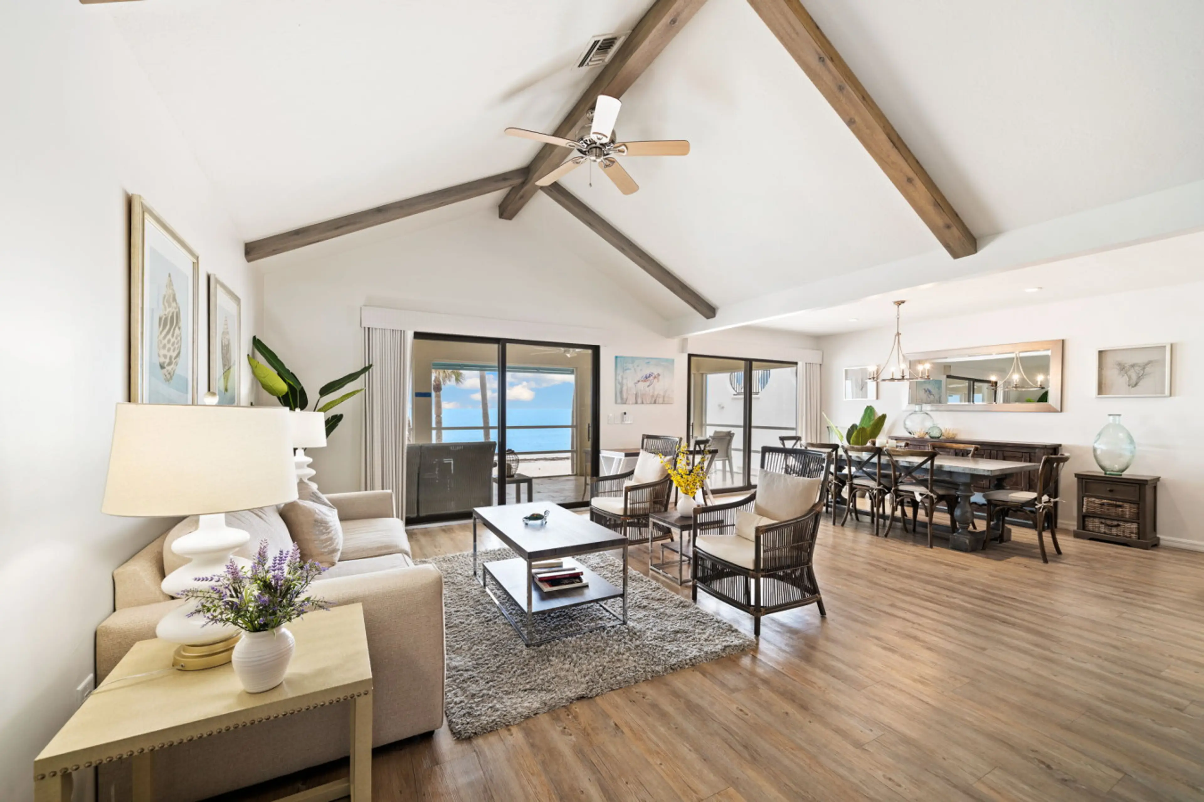 Relax in this airy beachfront living space with stunning views of the Gulf