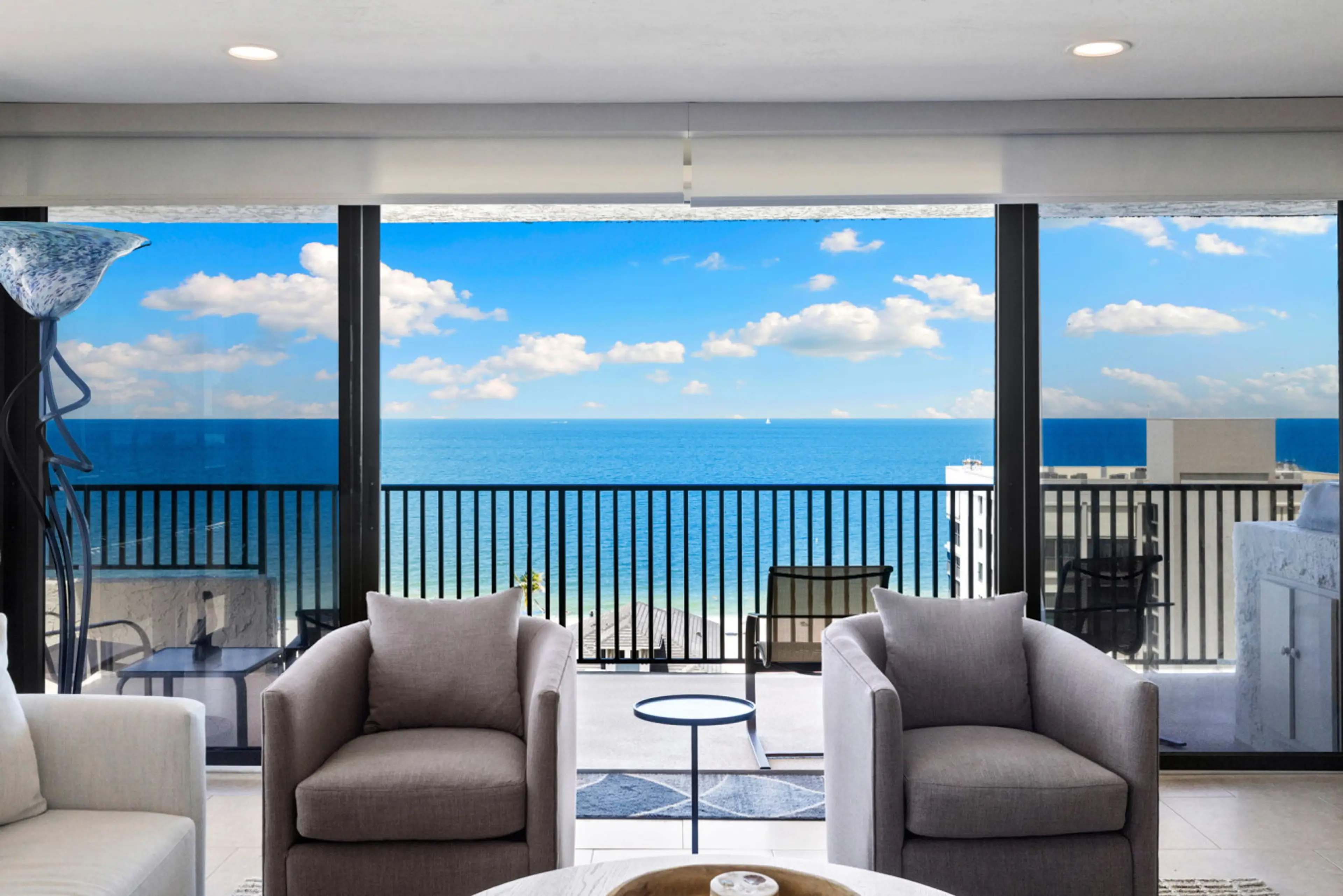 Unwind on the balcony with wine, sea breezes, and an endless horizon in view