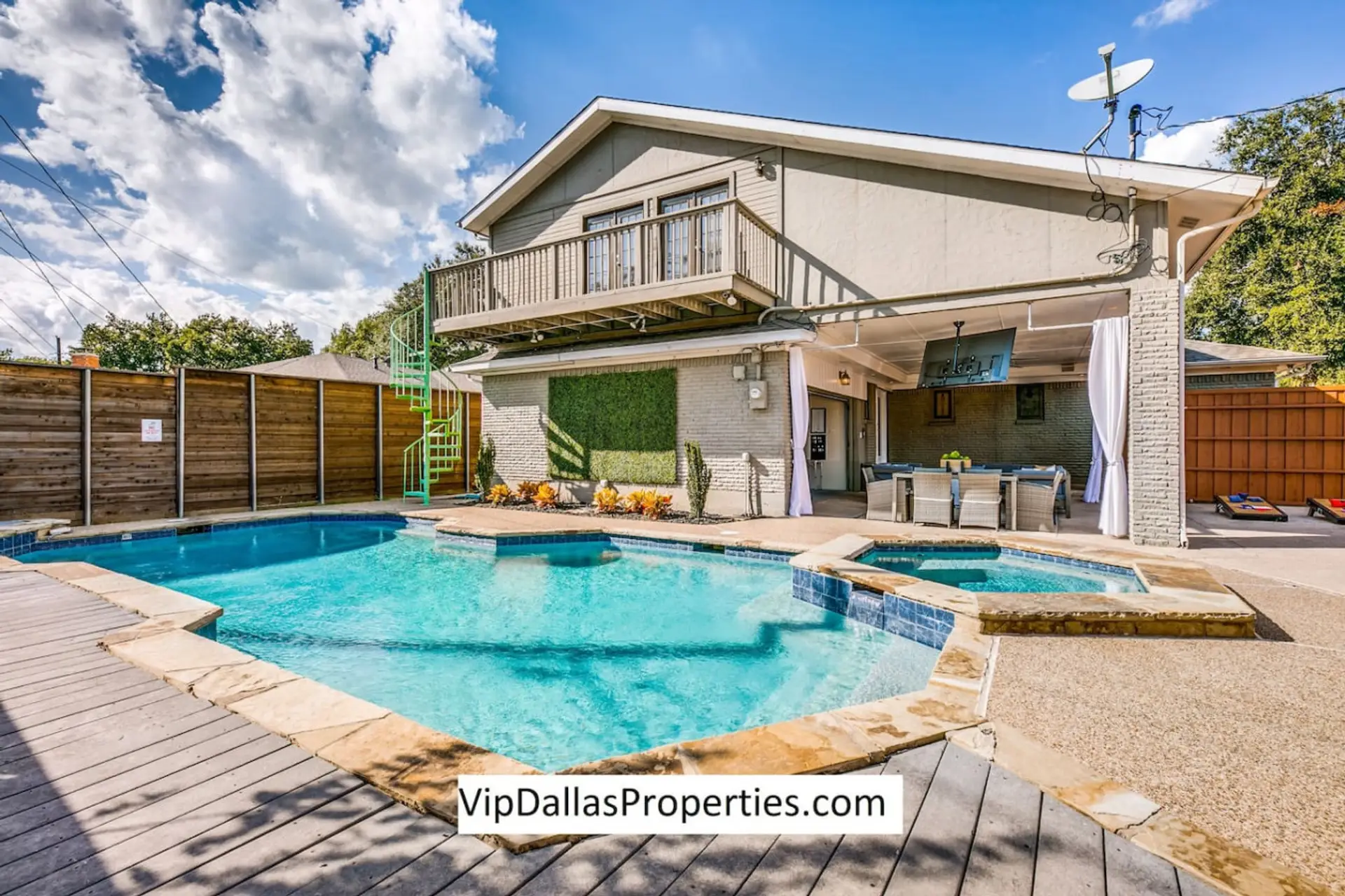 Large, fenced backyard area with a lot of privacy for your group stay! Enjoy the pool, hot tub, and lounging in the sun or shade. Watch TV while you grill, play games, or just enjoy dinner outside on a nice day.
