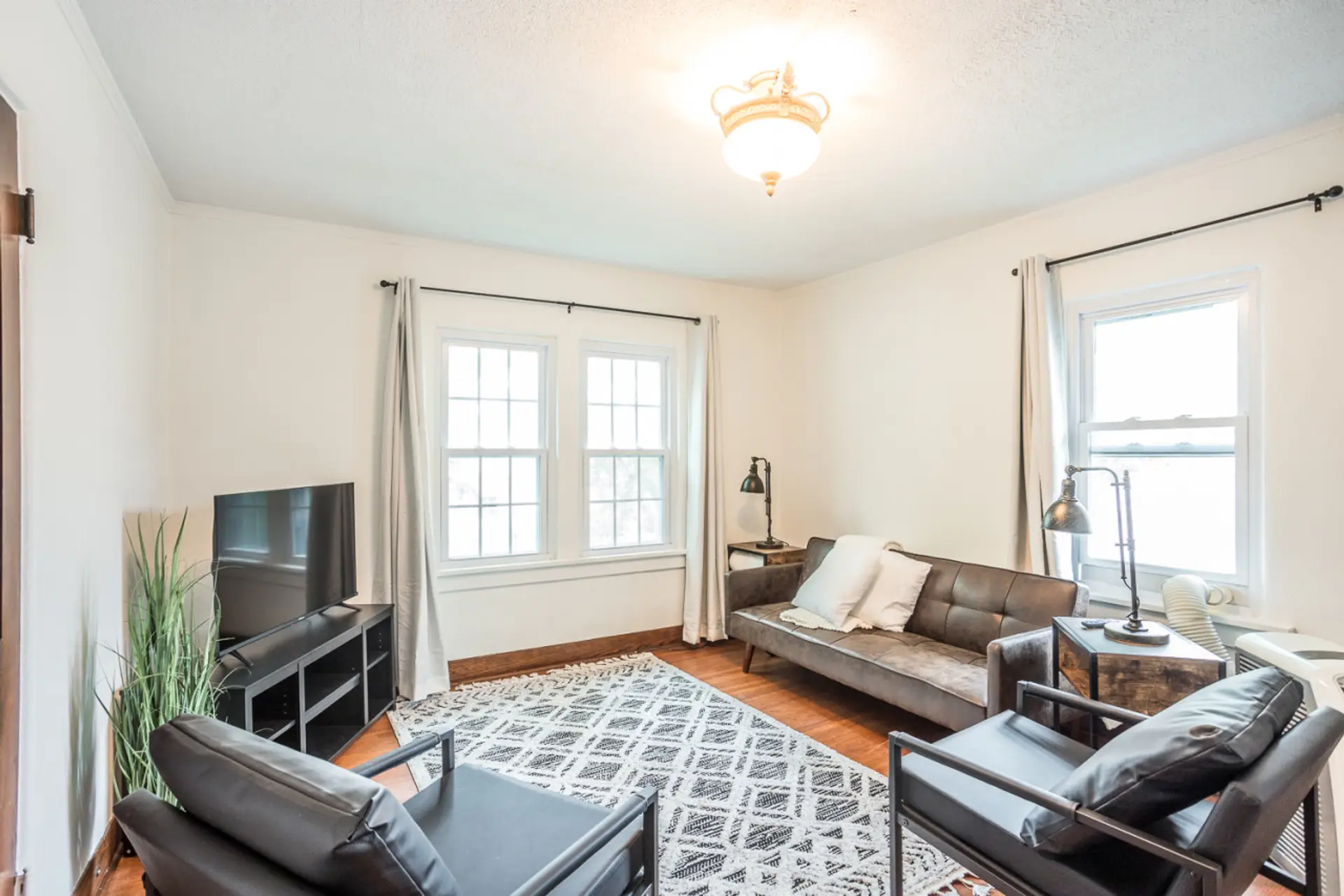 Unwind in comfort and style in our bright, modern living room. The perfect spot to relax after a day of exploring Sioux Falls.
