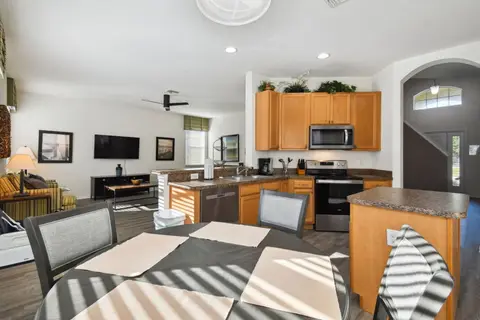 Breakfast table in front of the kitchen