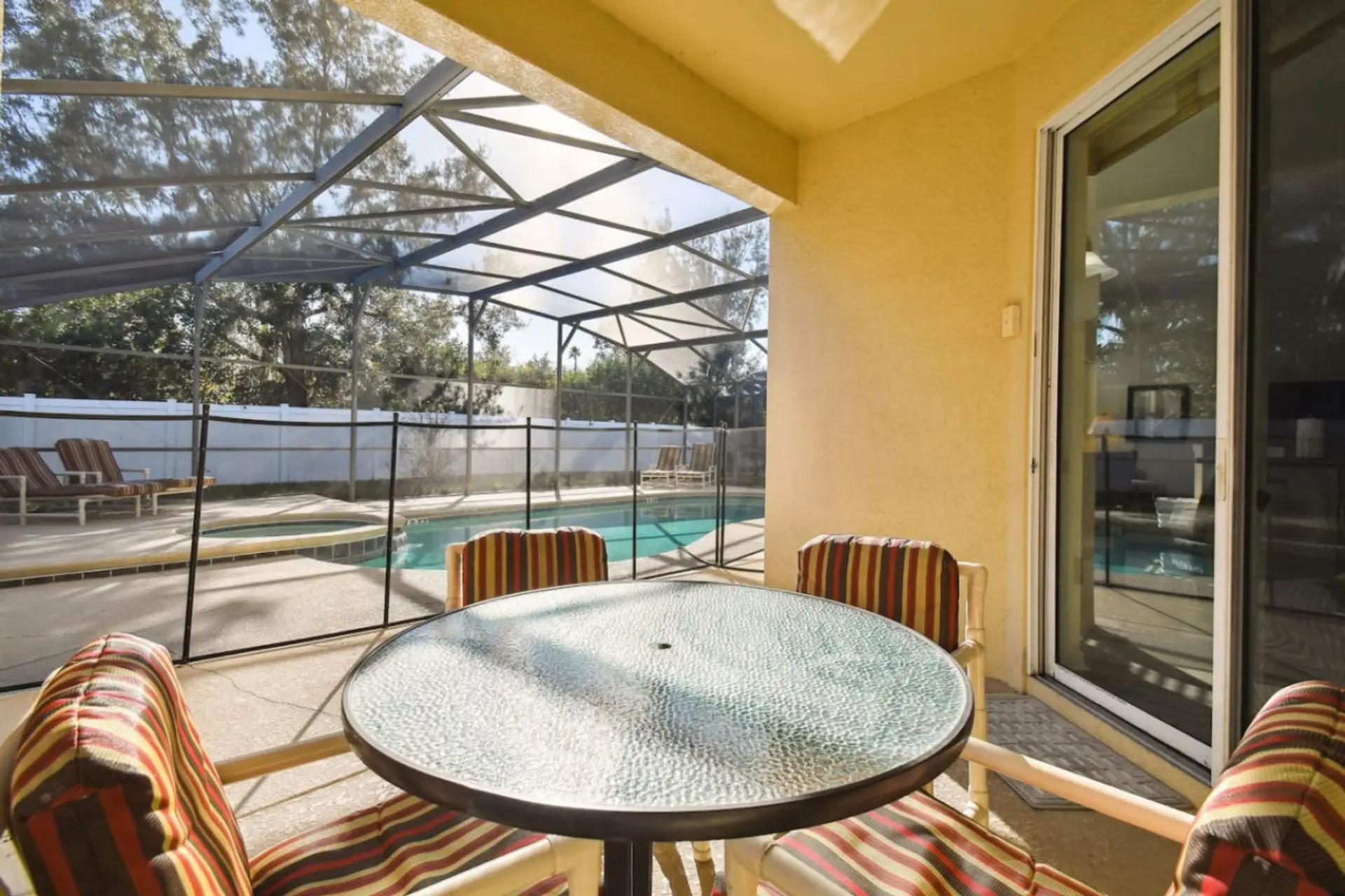 Enjoy meals poolside with a view of the sparkling water.