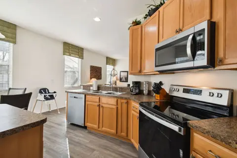 Bright kitchen with stainless steel appliances