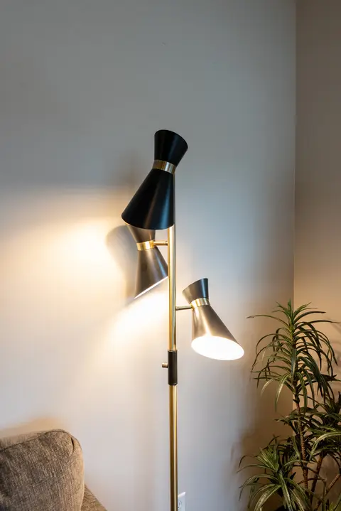 Black floor lamp with three adjustable shades