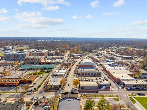 Aerial view of a main street lined with shops in Overland Park