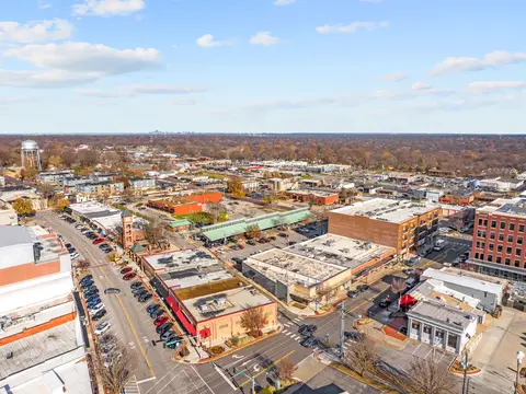 Aerial view of downtown Overland Park streets and brick buildings