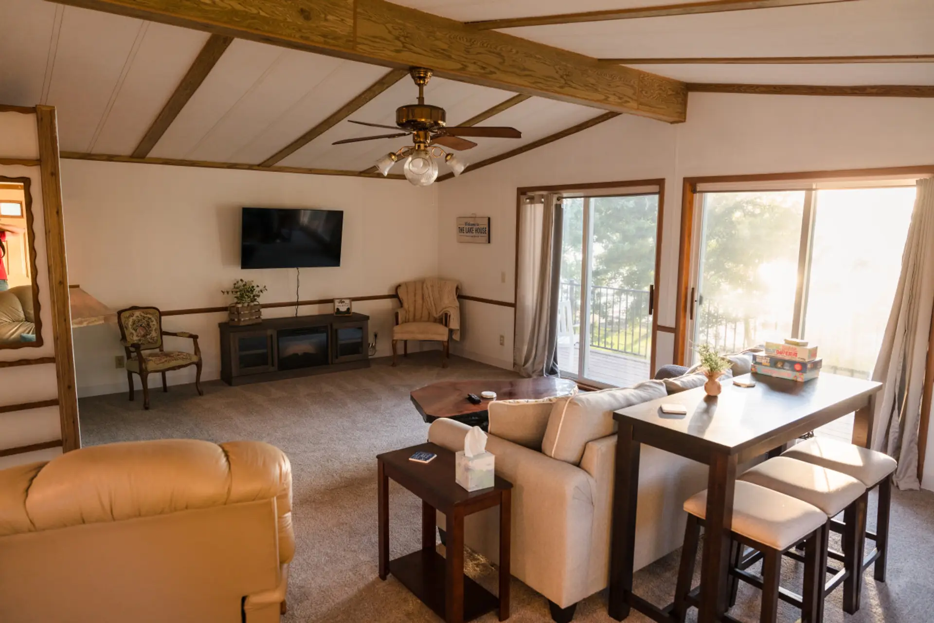 Living Room – Cozy, spacious, and full of lake views! 🛋️✨
