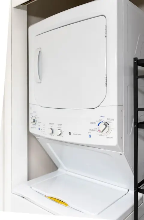 Front of a stacked washer and dryer