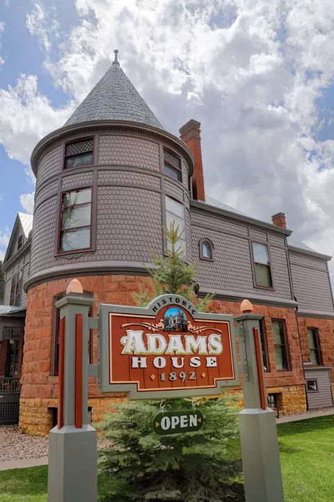 Historic Adams House in Deadwood, with its turret