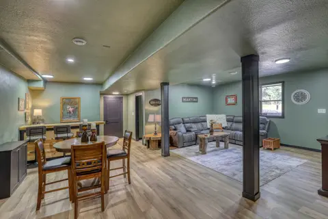 Pub table for four and a bar counter, with the sectional beyond