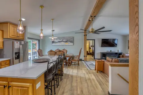Kitchen island looking toward the dining table and living room